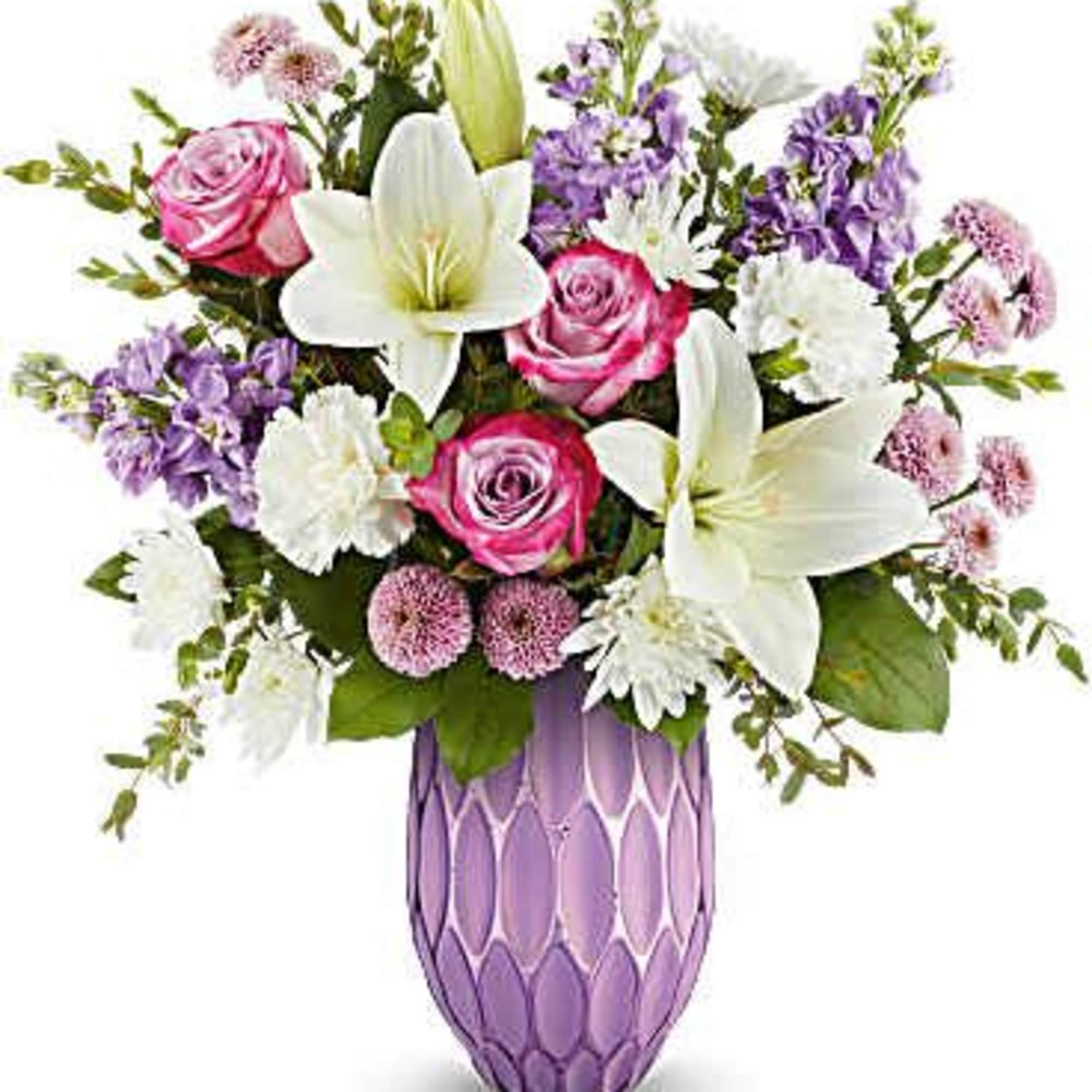Pink roses and white lilies in a purple vase
