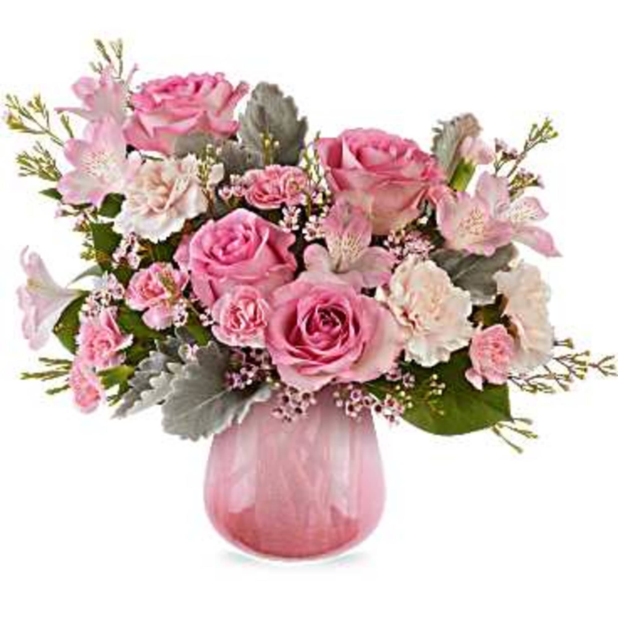 Pink roses and carnations in a pink glass vase