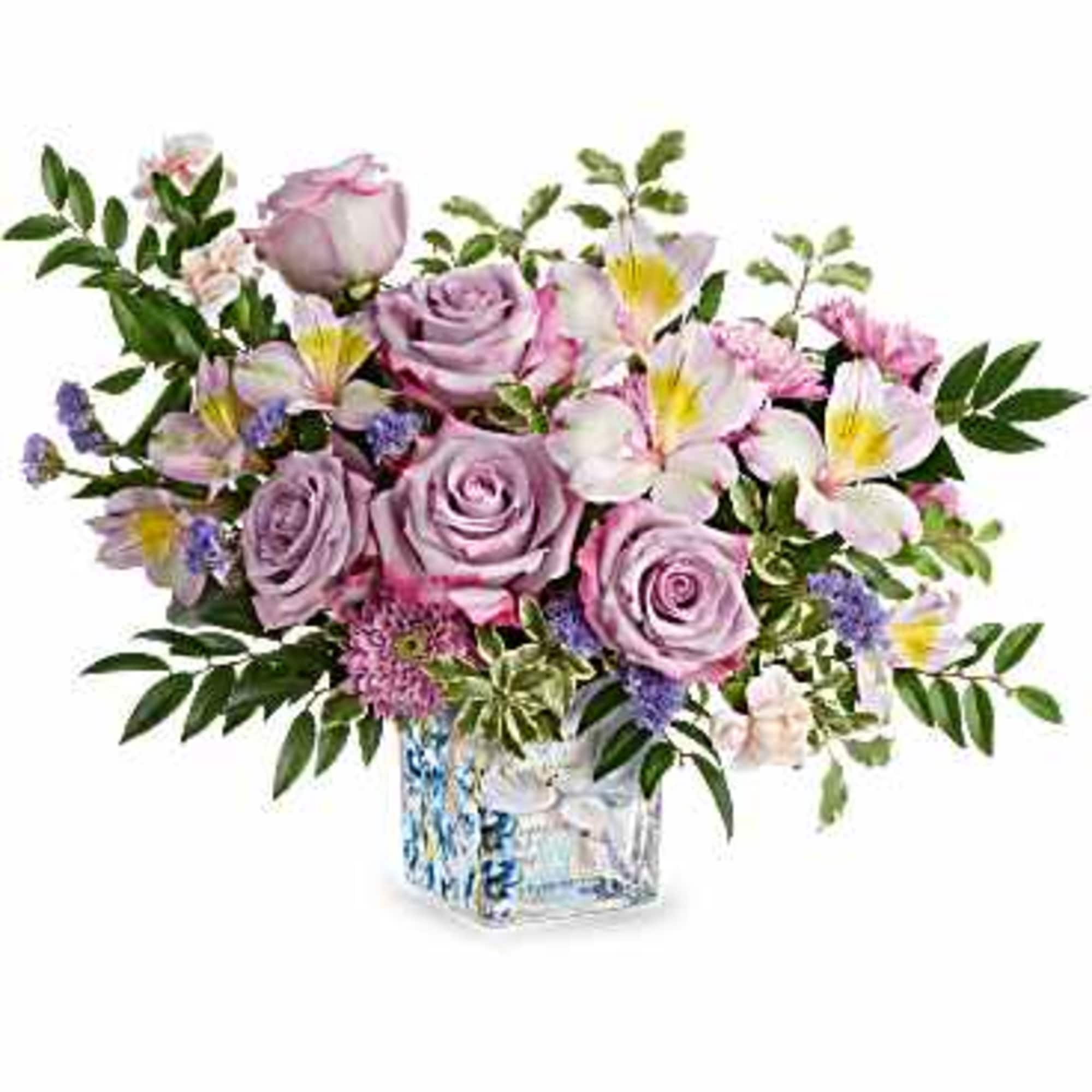 Lavender roses take center stage in this pastel bouquet, making Written in