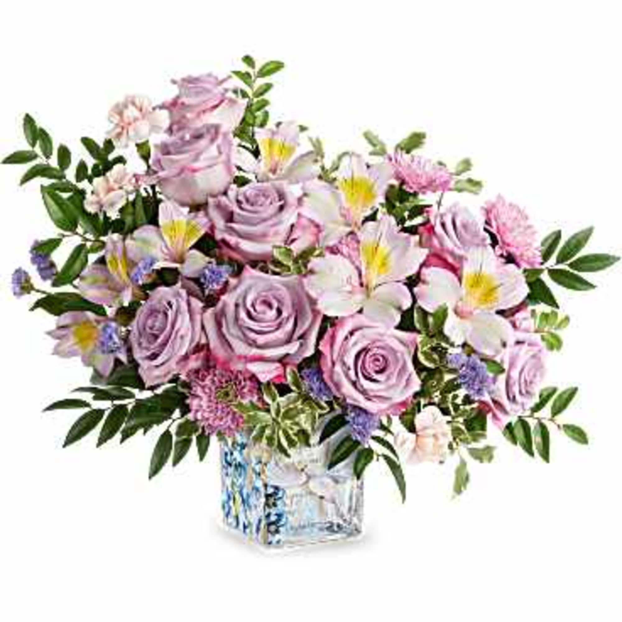 Lavender roses take center stage in this pastel bouquet, making Written in