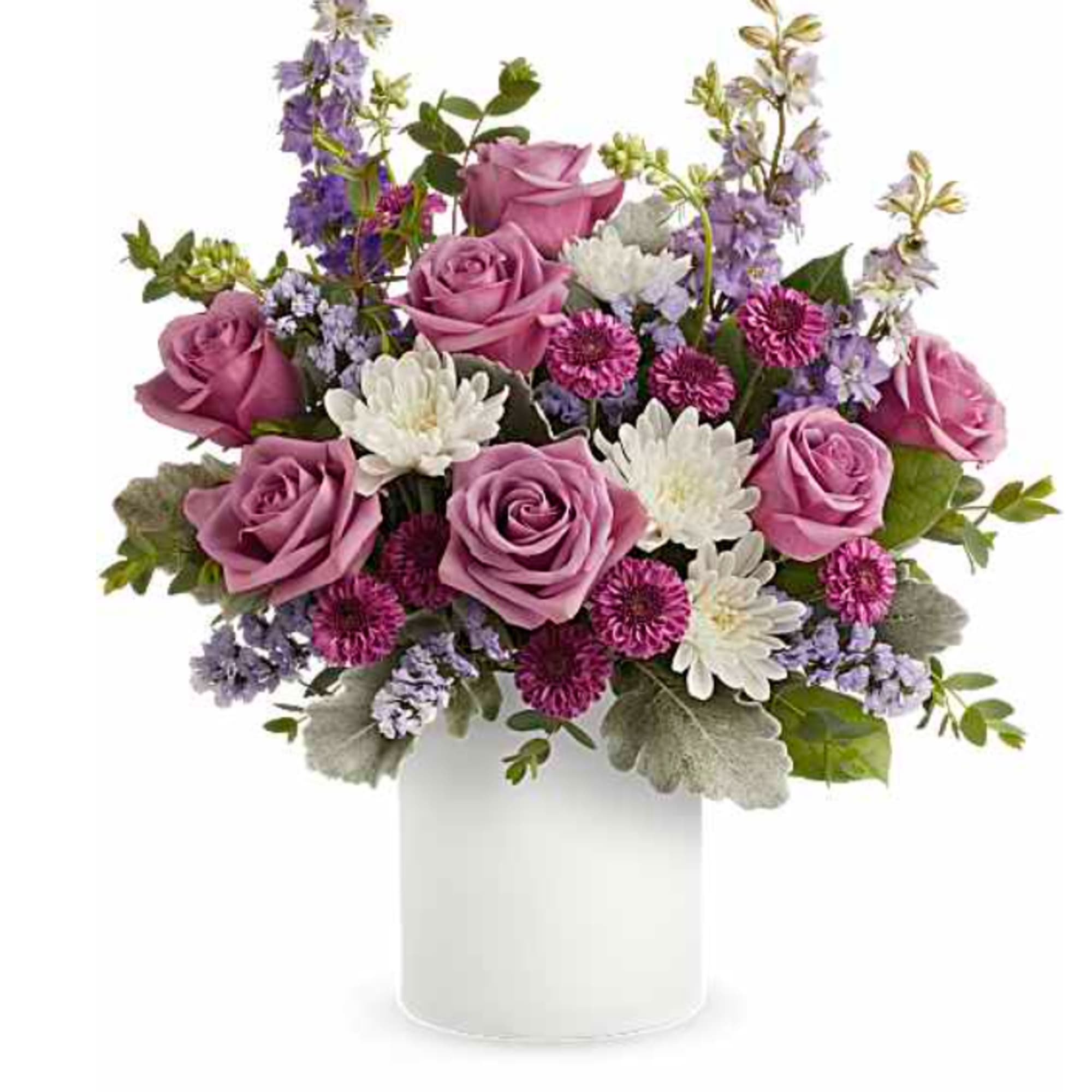 Pink roses and white daisies in a white vase