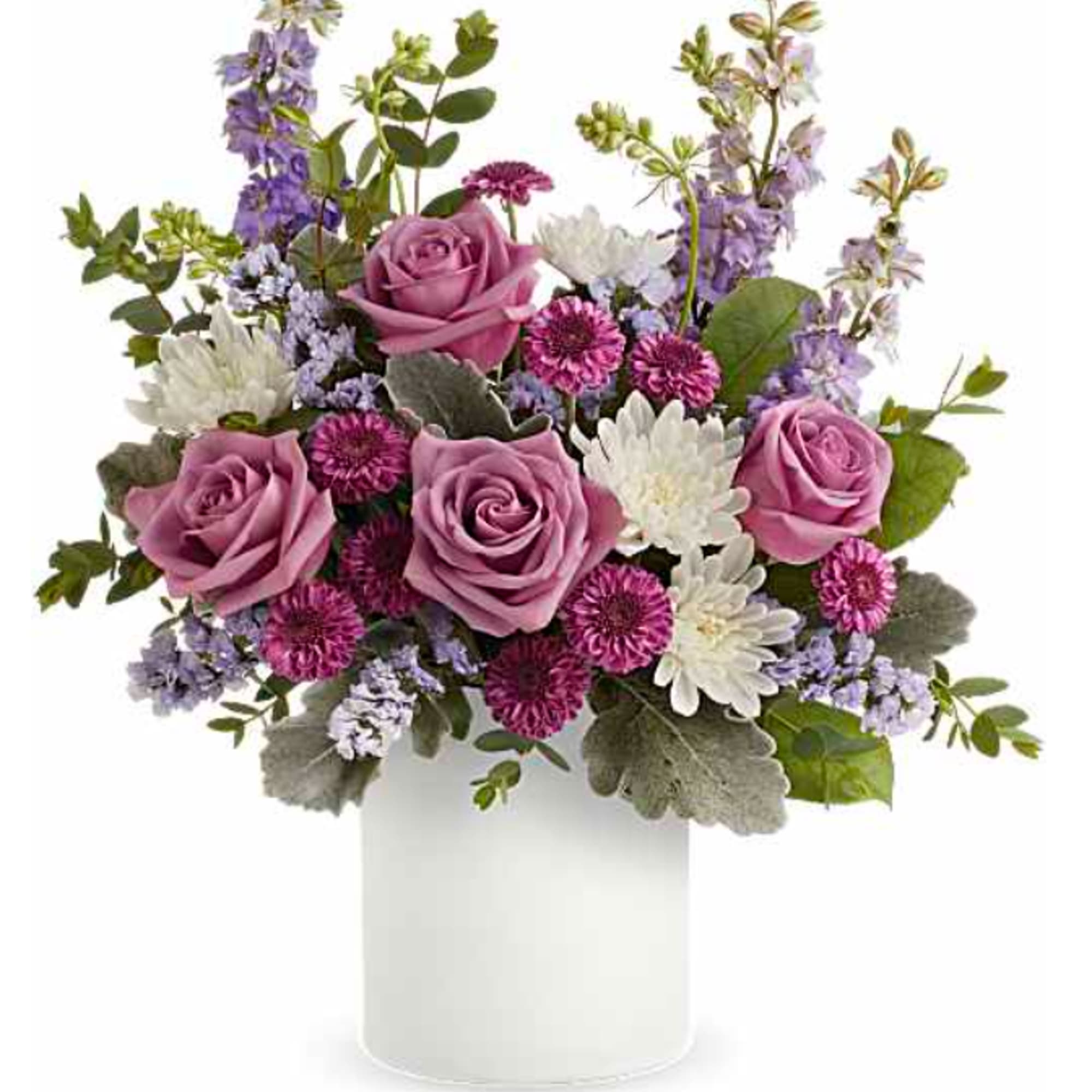 Pink roses and white daisies in a white vase