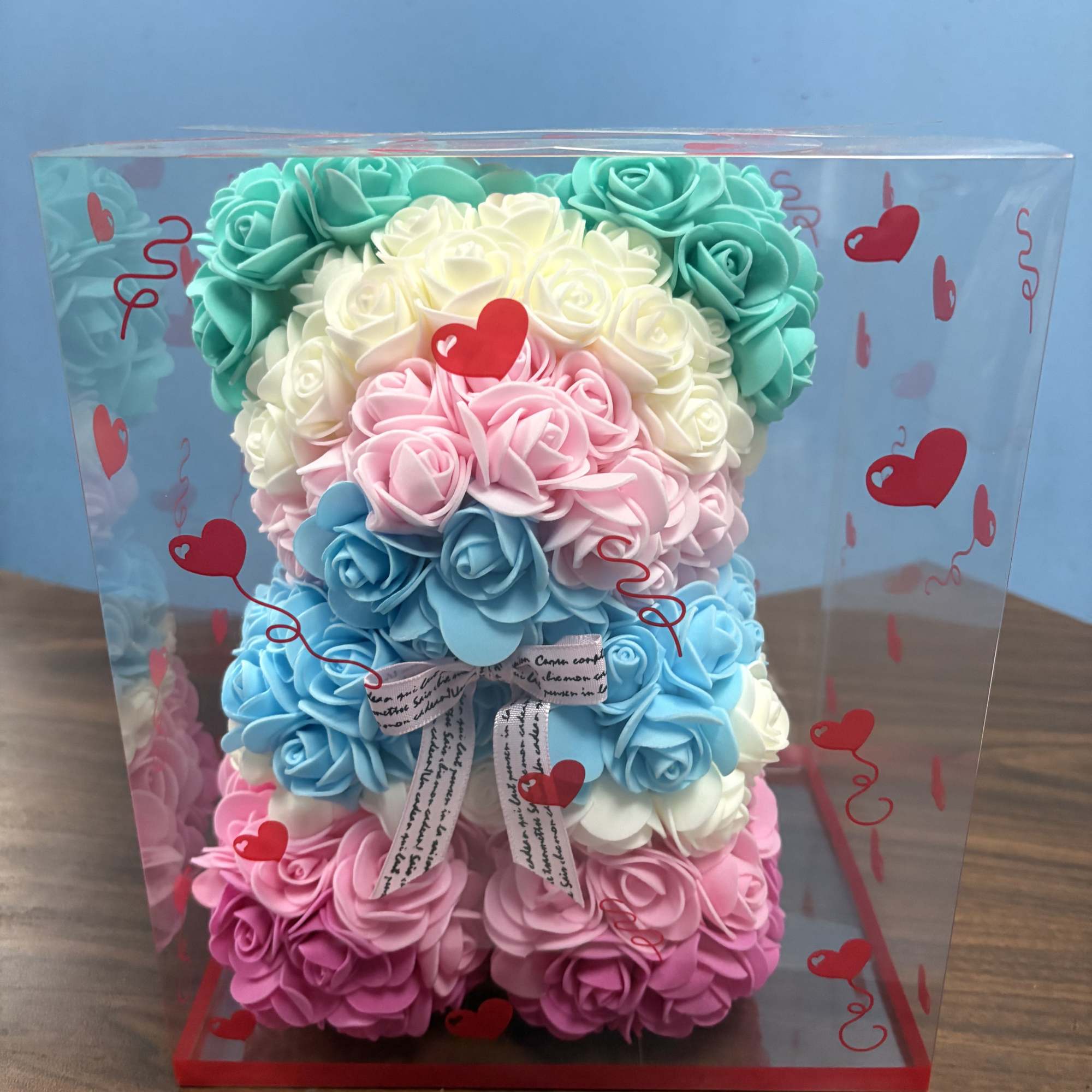 Soft pastel rose blooms sculpted into a playful teddy-bear shape make this, photo 2 of 4