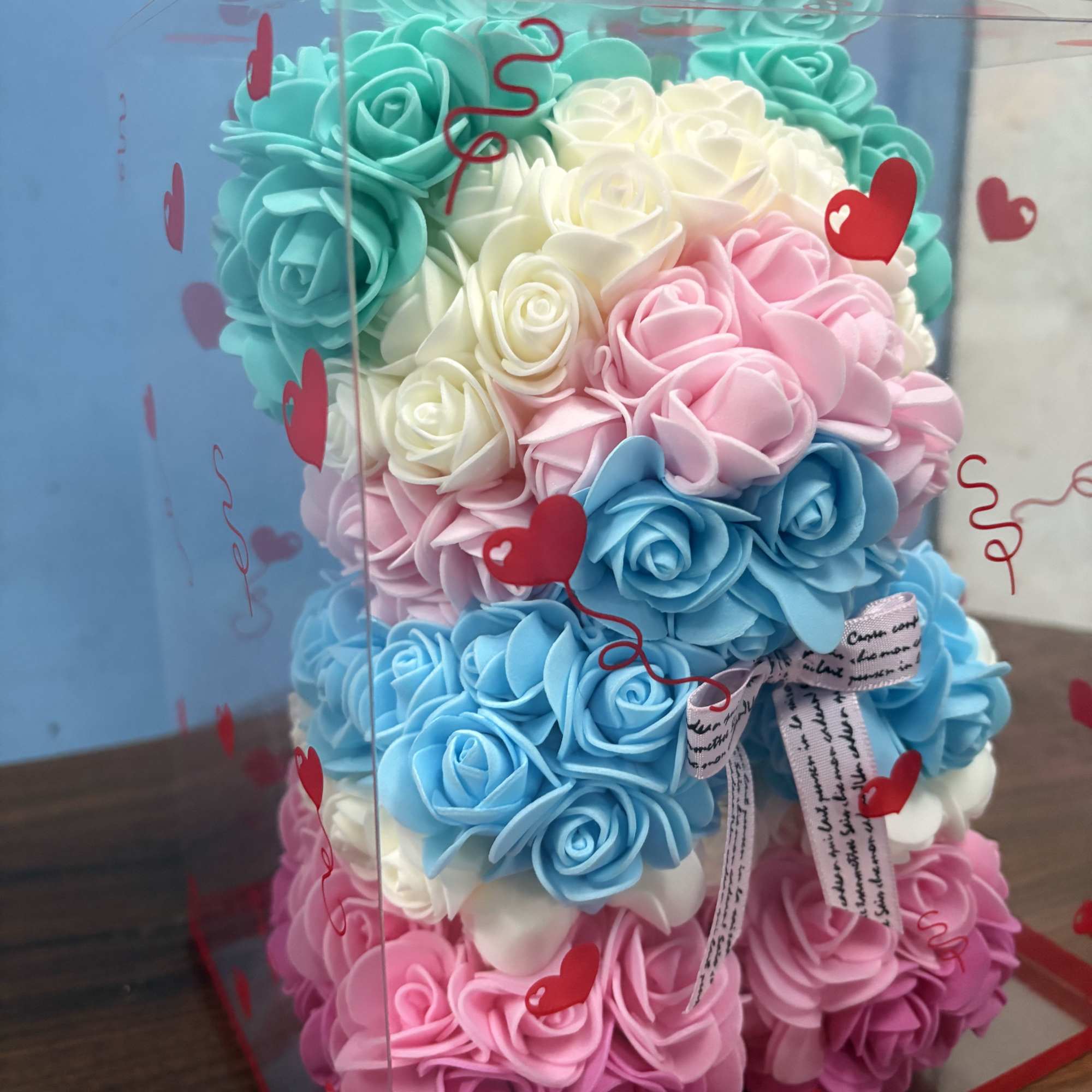 Soft pastel rose blooms sculpted into a playful teddy-bear shape make this, photo 3 of 4