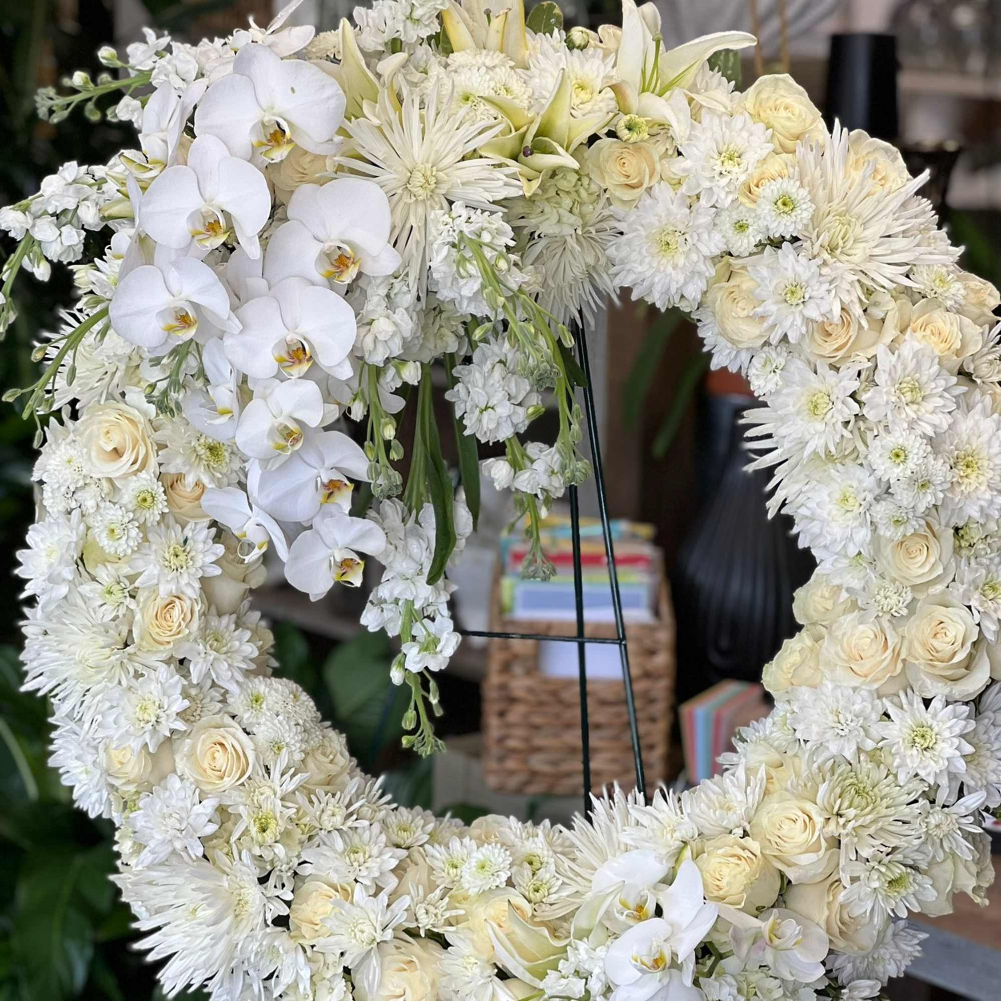 This large classic wreath is delivered on an easel, and is a