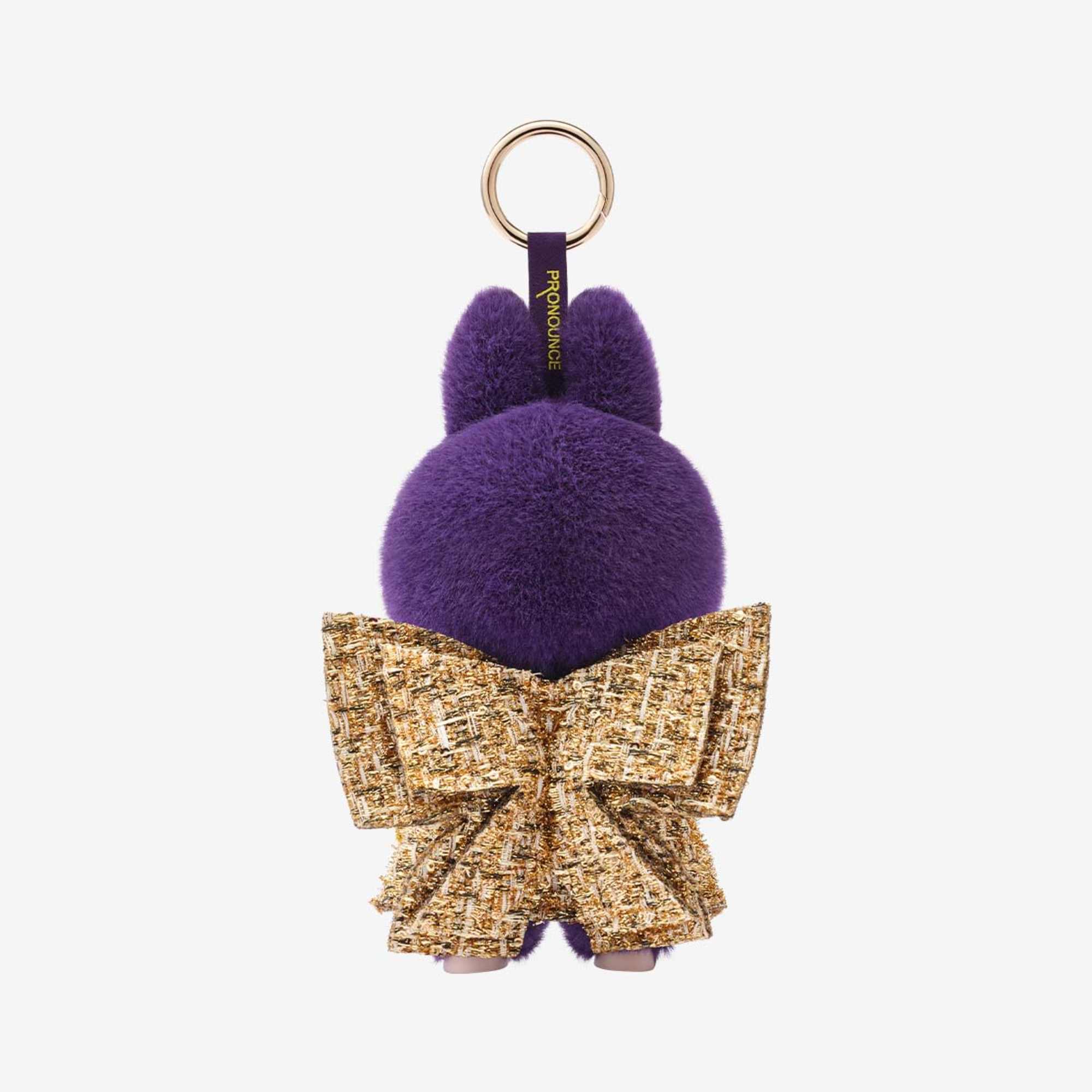 Purple plush keychain with a gold bow and ring