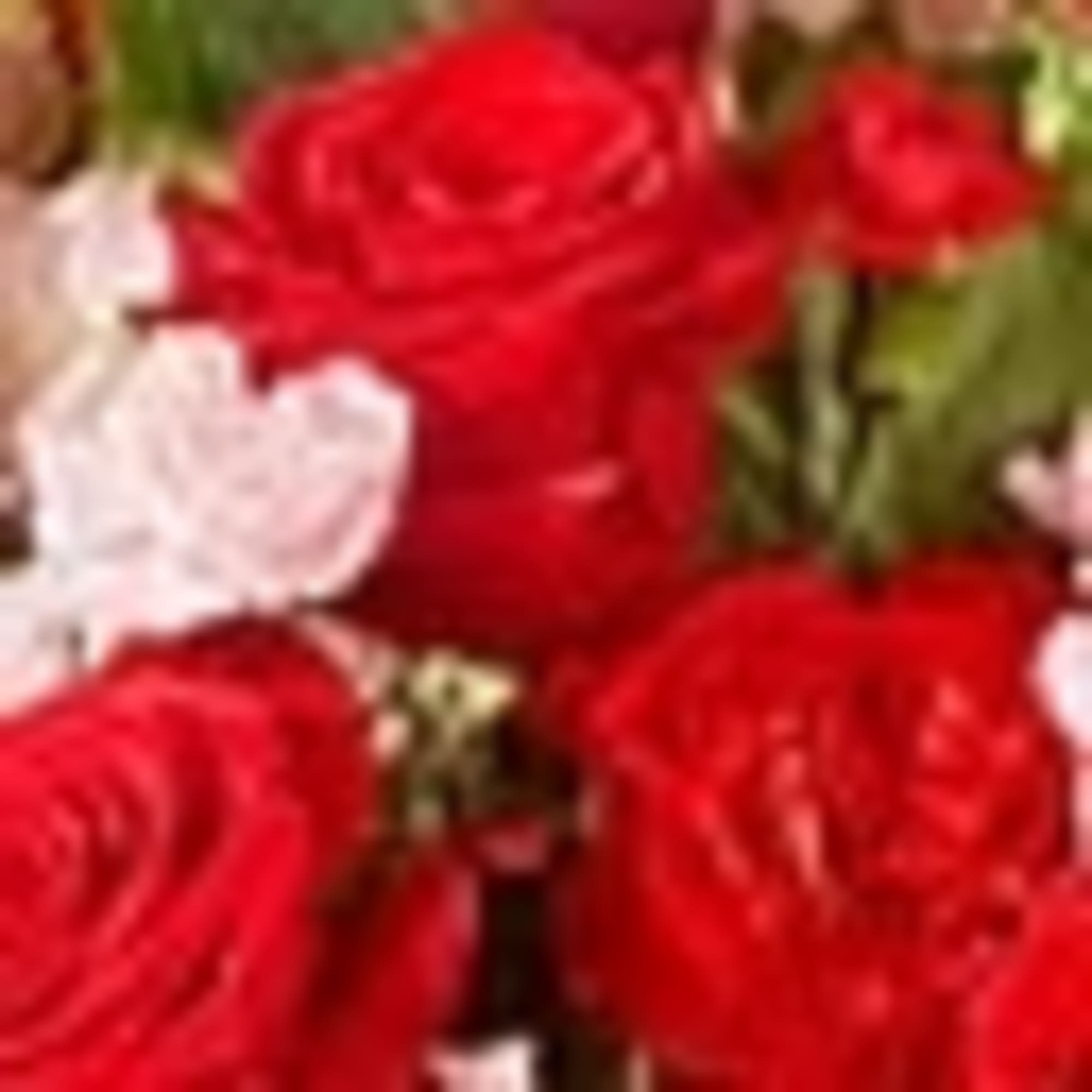 Sweet, delicate, and dazzling. This pink and red arrangement is the dose