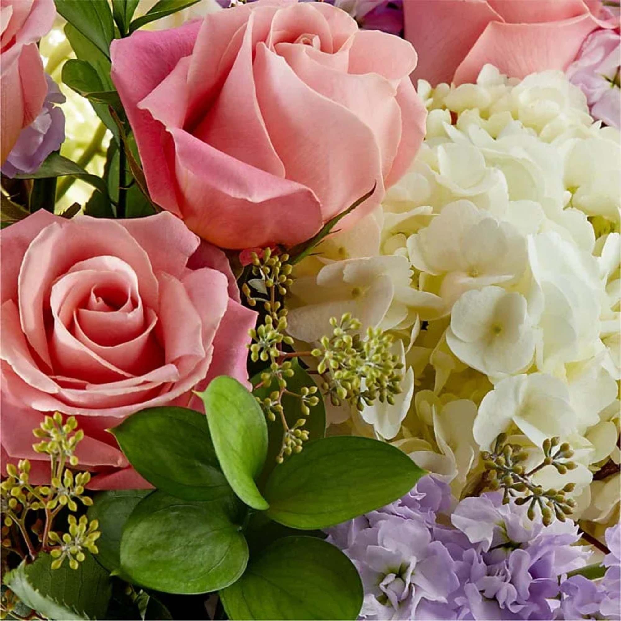 Experience a floral arrangement designed to captivate the senses. Our latest bouquet