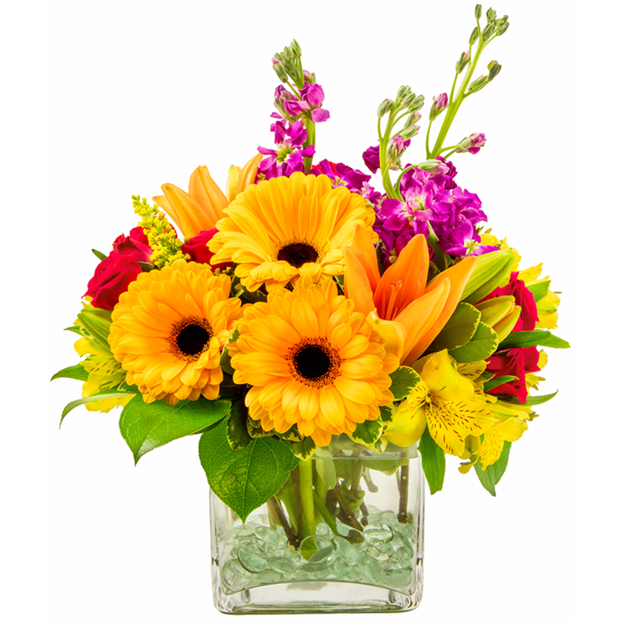 Bright mixed bouquet in a clear square vase