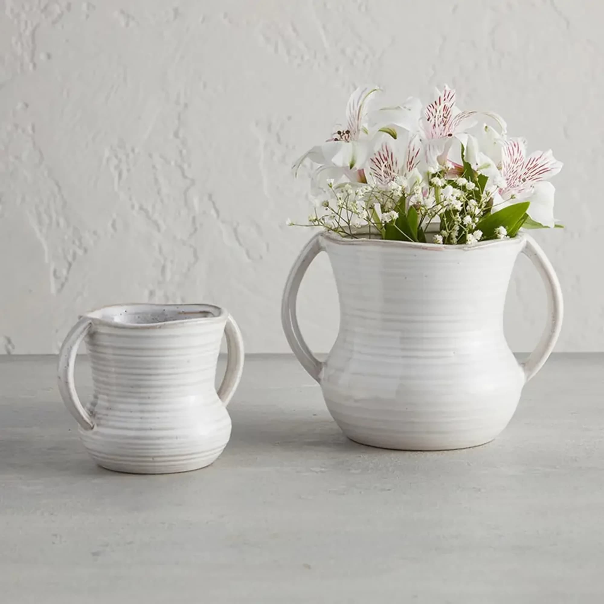 Petite Flower Vase - 
Material: Porcelain
&bull; Size: 3.5" Dia x 4.75" H
