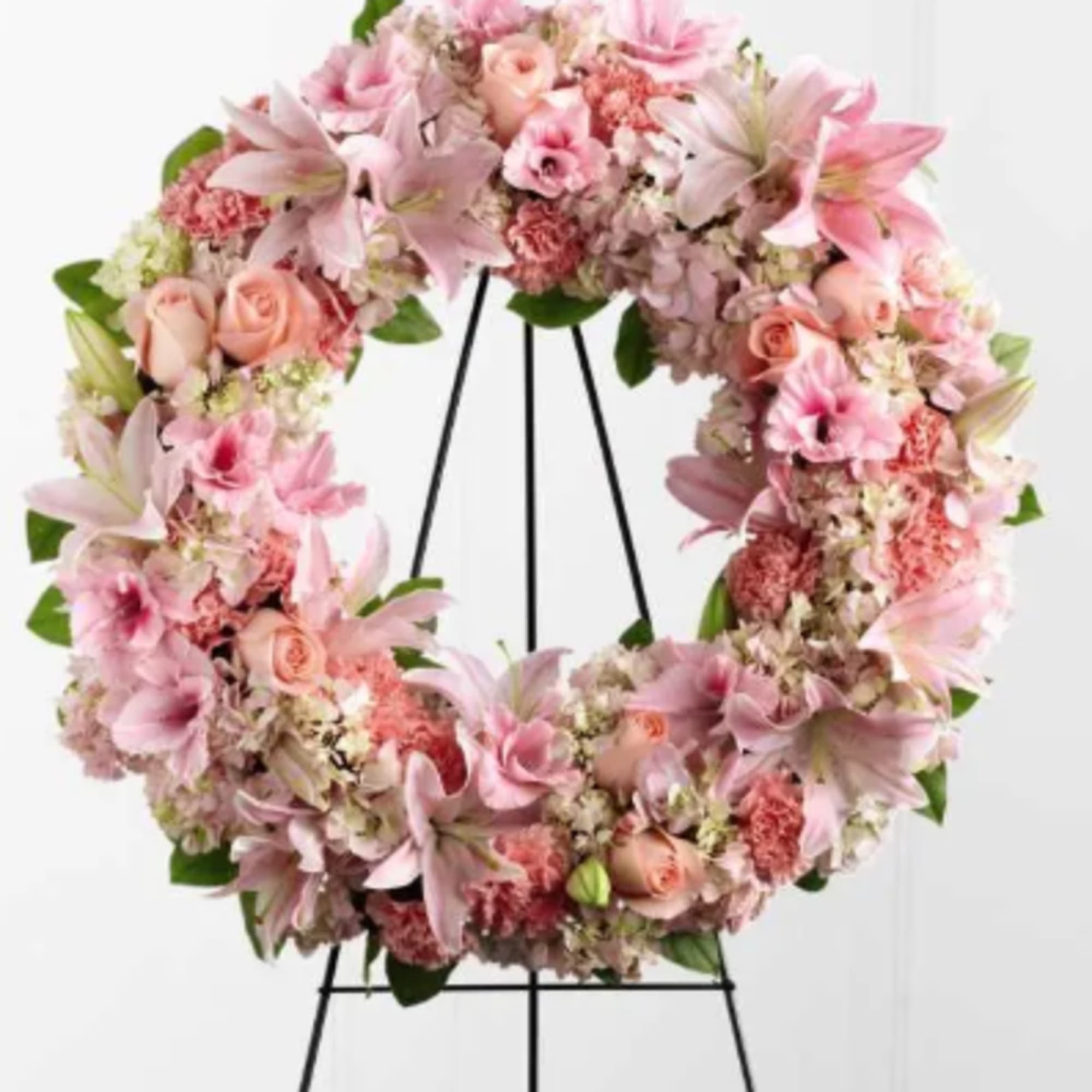 Loving Remembrance Wreath is a blushing display of grace and beauty to