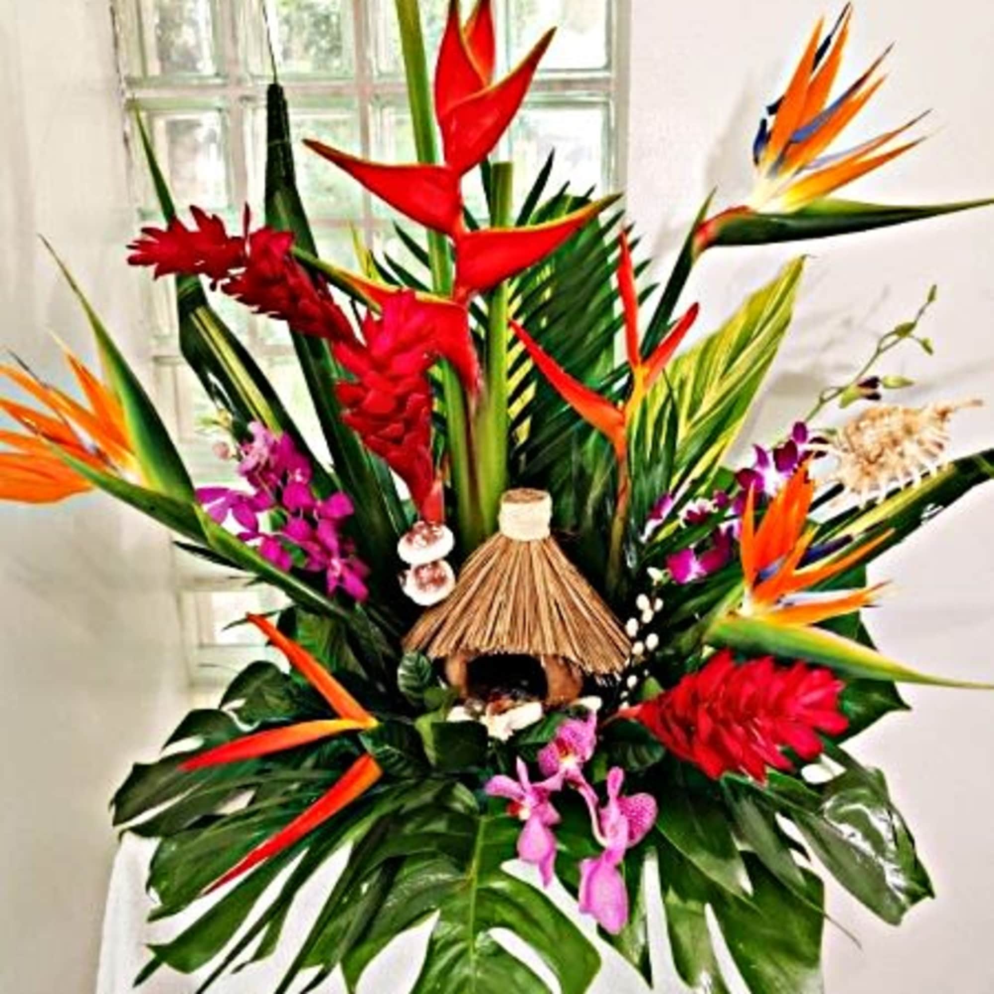 Hawaiian life comes to you with this tropical arrangement full of birds