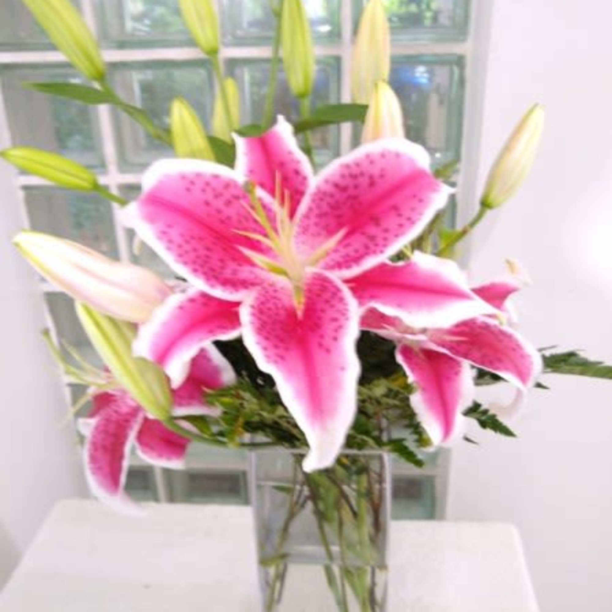 Send this sweet bouquet as an expression of your sympathy. Fragrant pink
