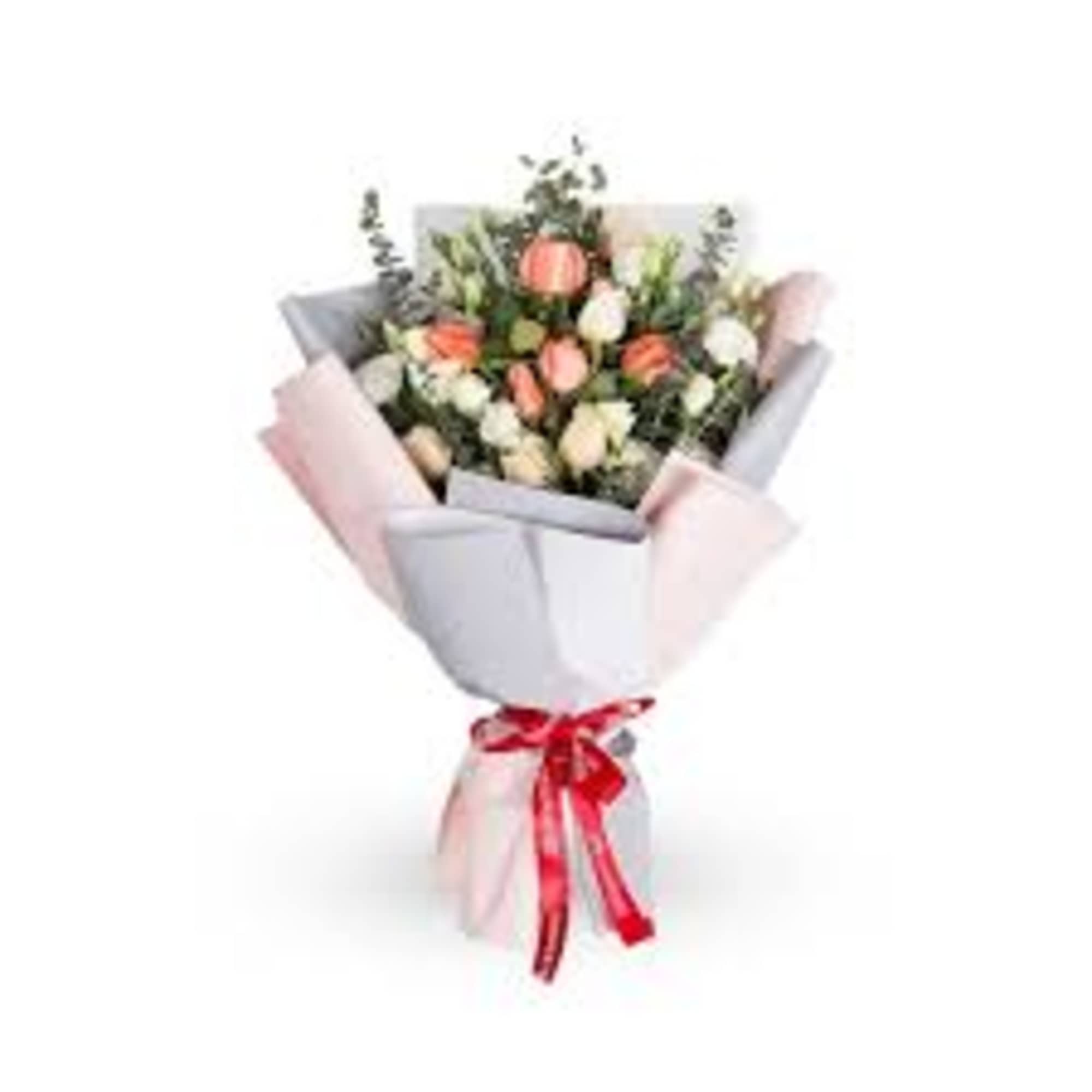 Bouquet of peach and white flowers wrapped in pastel paper with a red ribbon