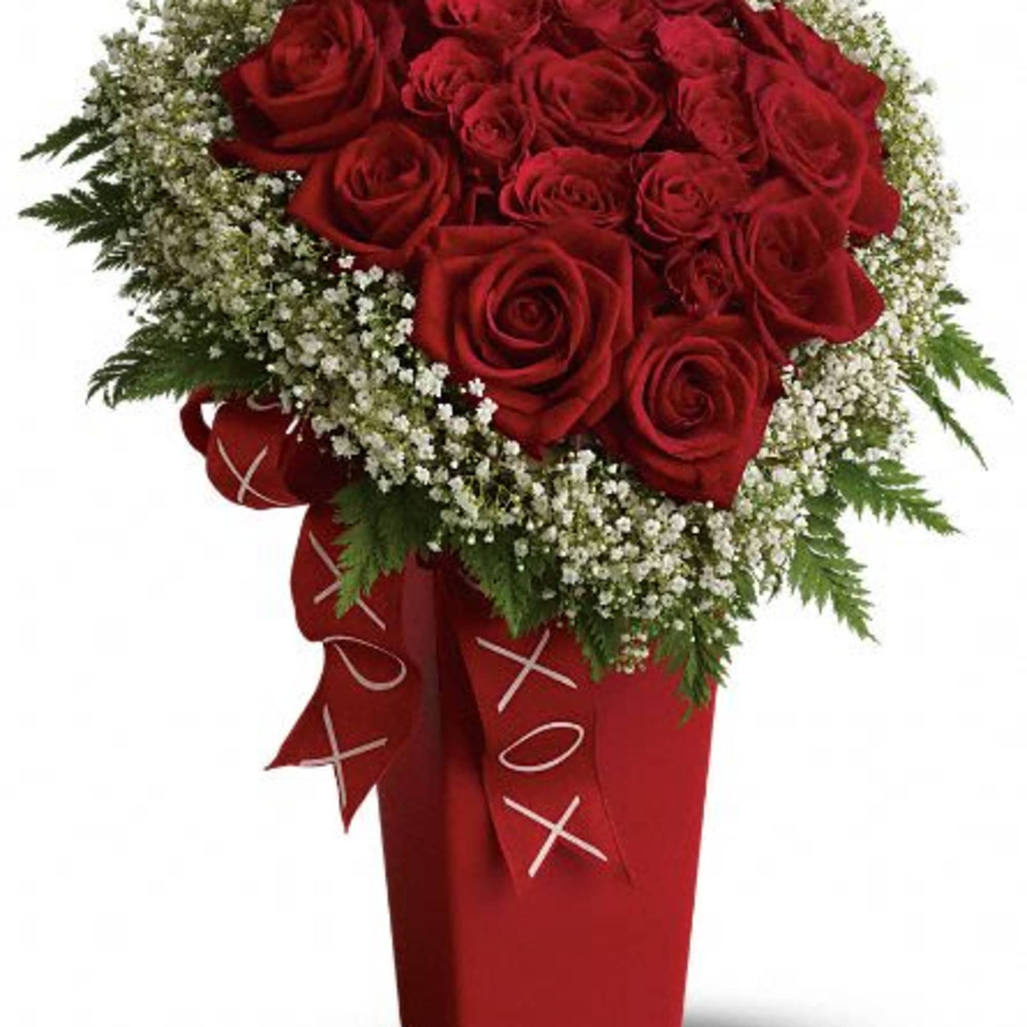Red roses arranged in a tall red box with a ribbon