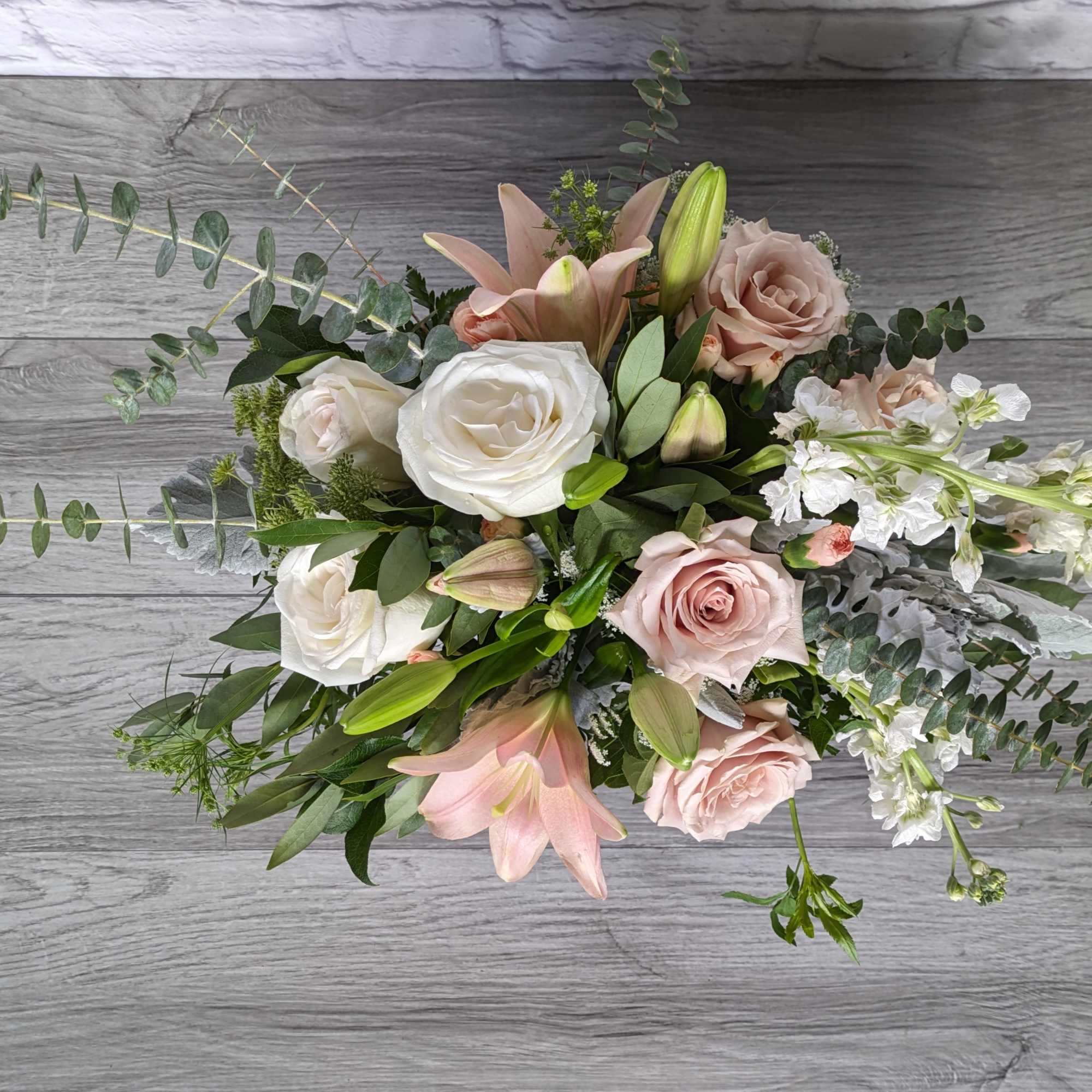 Dreamy Blush is A Ladybug Floral exclusive bouquet. High end roses in