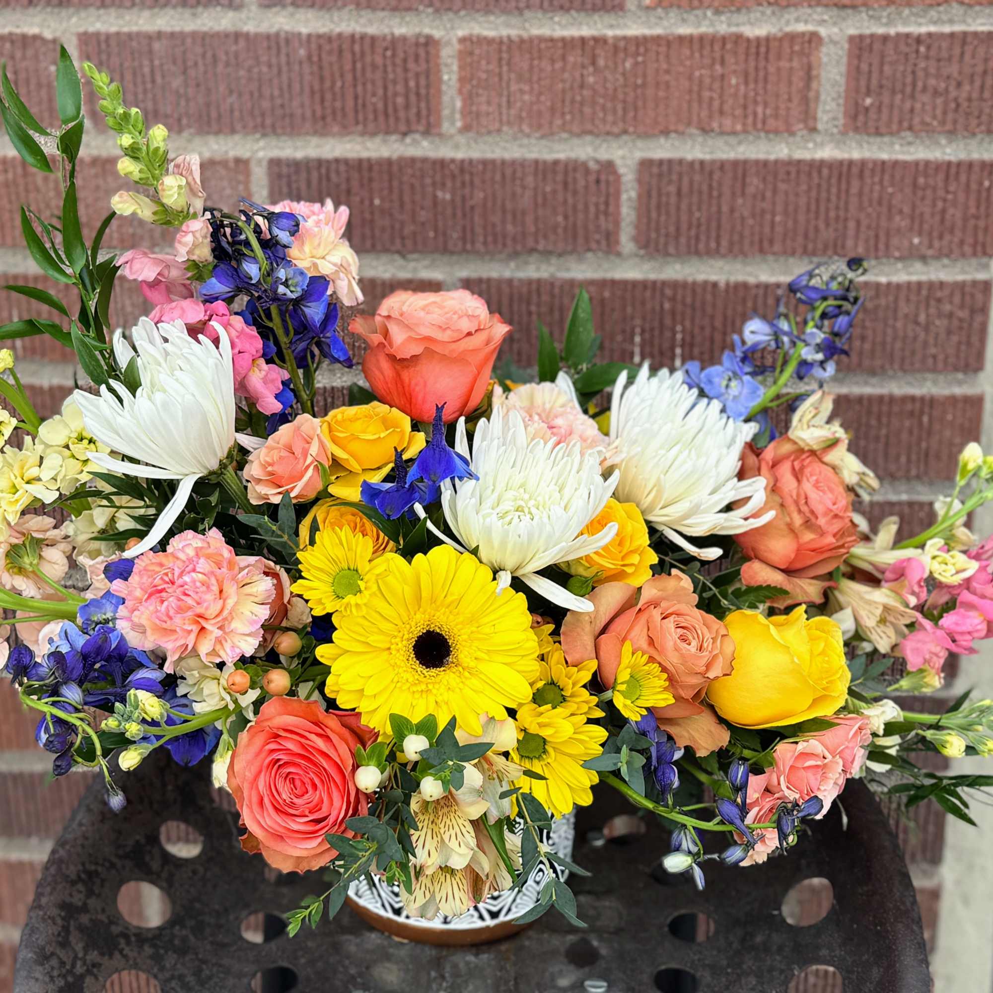 Mixed bouquet with roses, gerbera daisies, and white chrysanthemums