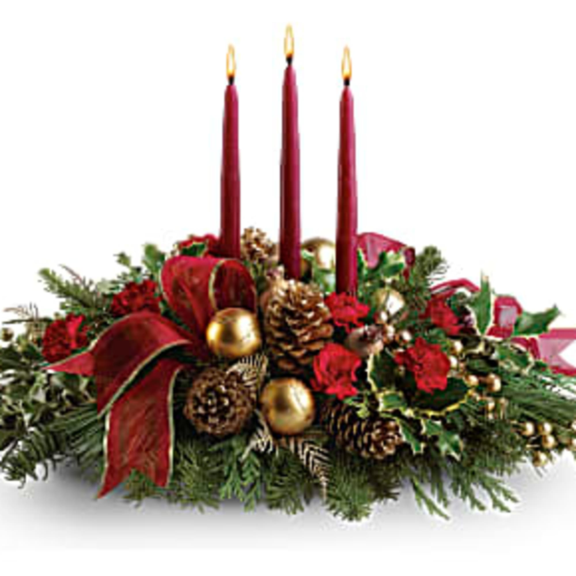 Holiday centerpiece with three red candles and pinecones