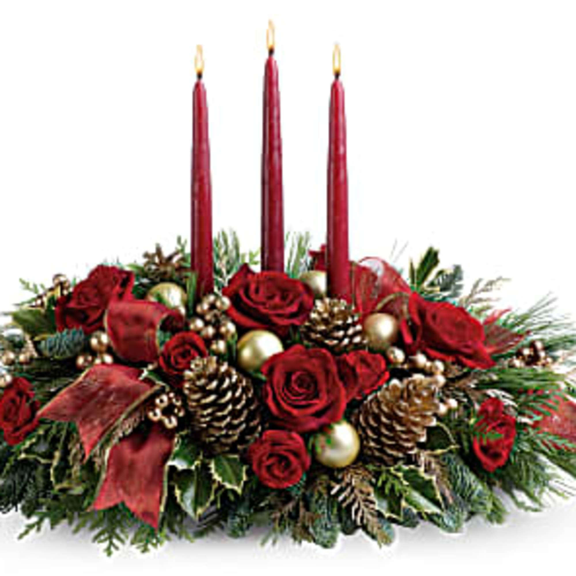 Holiday centerpiece with red roses, pinecones, and three red candles