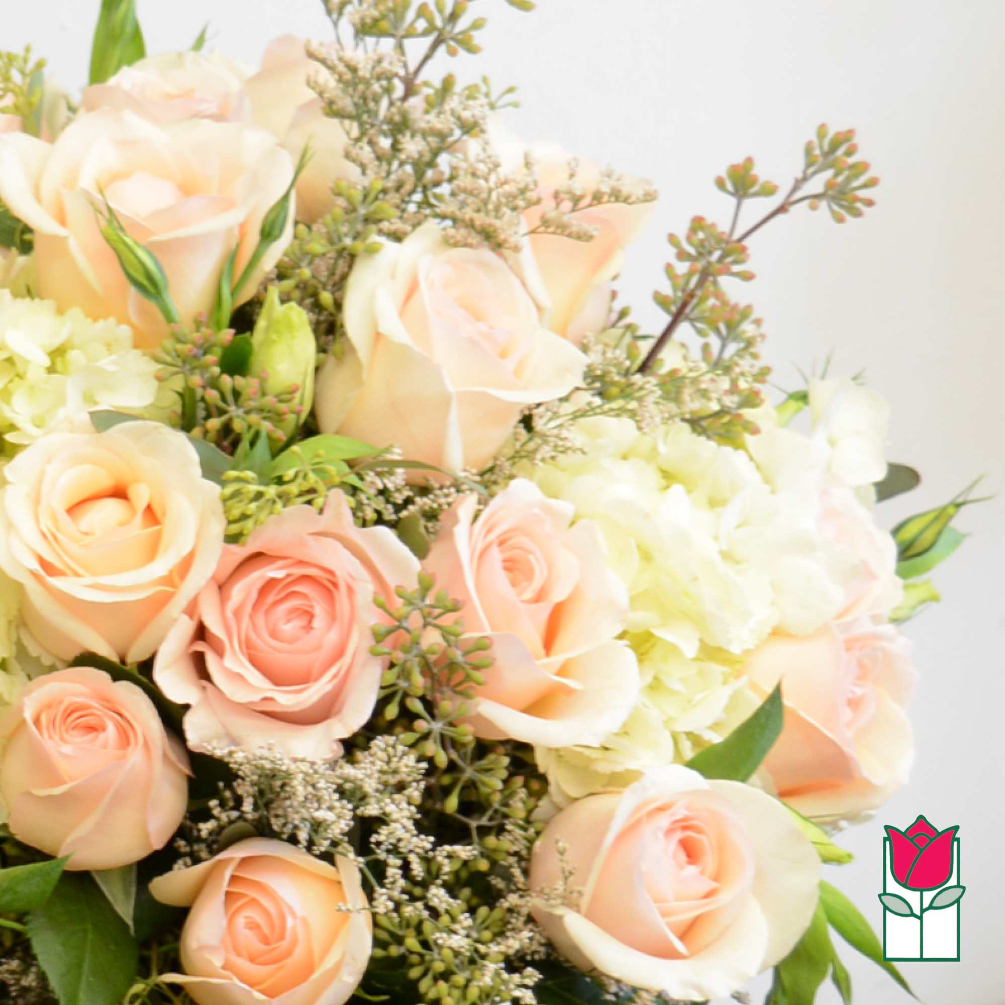 Bouquet of peach roses and white hydrangeas