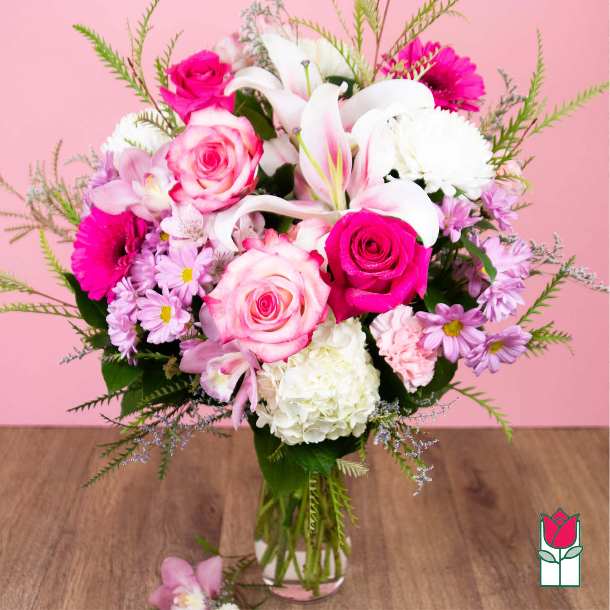 Pink and white mixed bouquet in a clear glass vase
