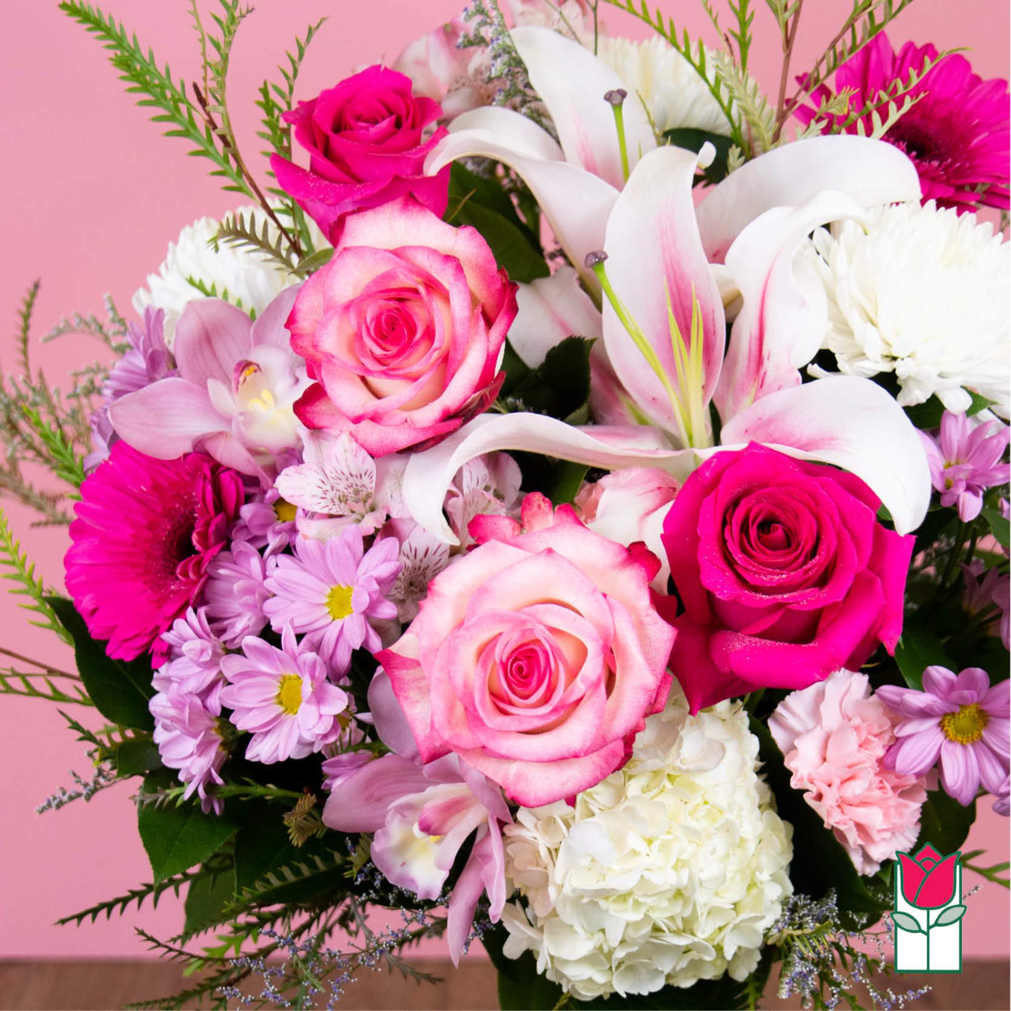 Pink and white mixed bouquet with roses, lilies, and daisies