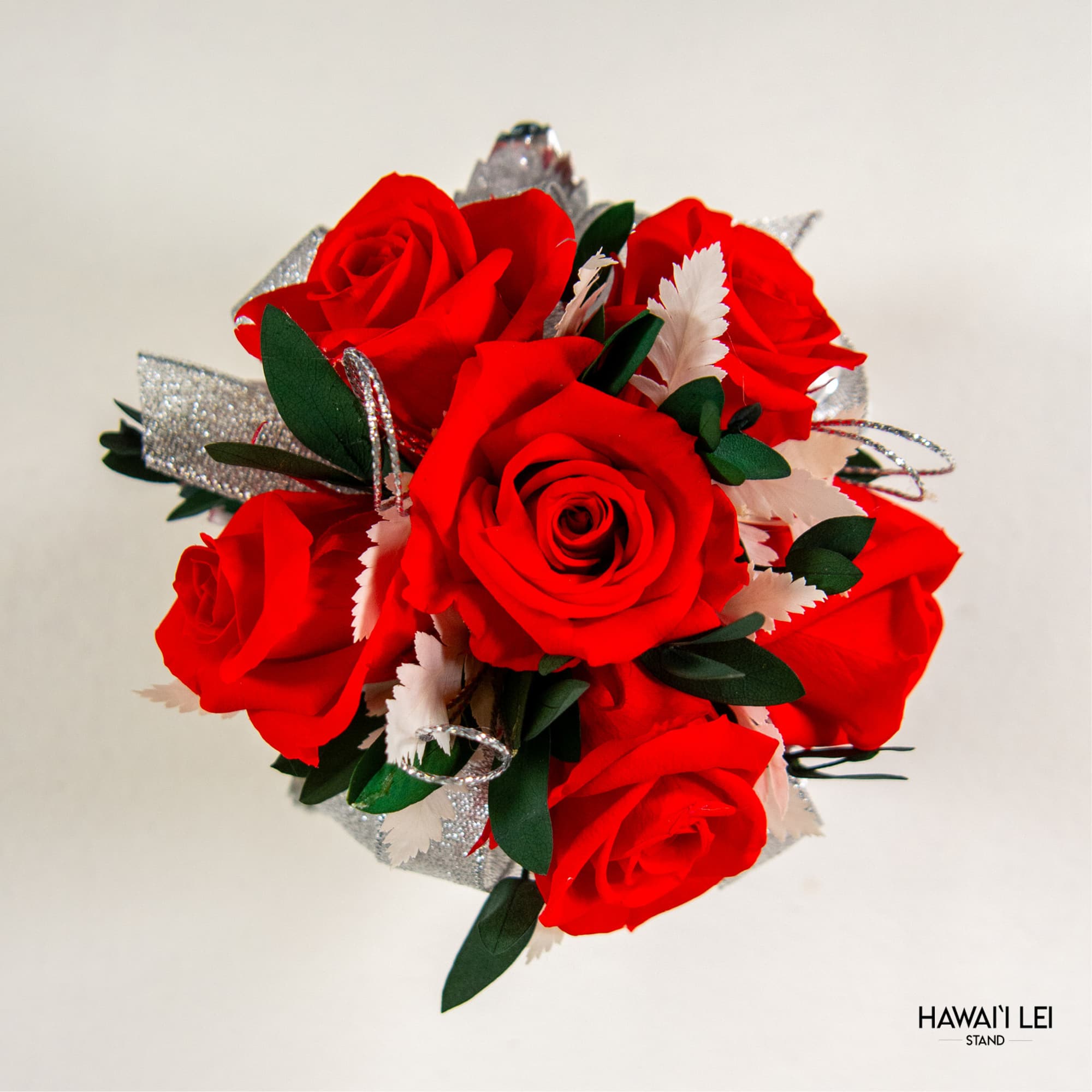 Bouquet of red roses with silver ribbon accents