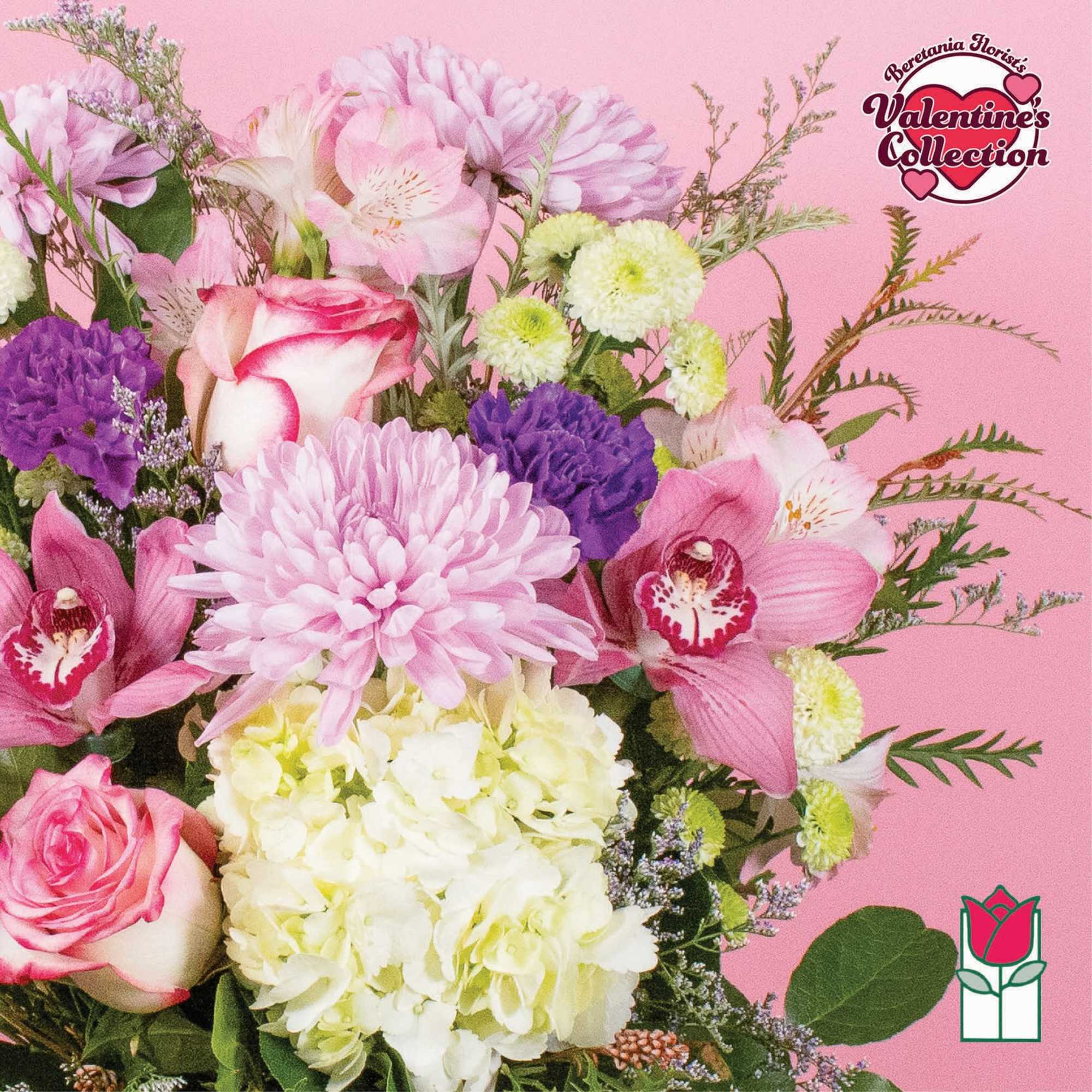 Pink and white bouquet with roses, orchids, chrysanthemums, and hydrangea