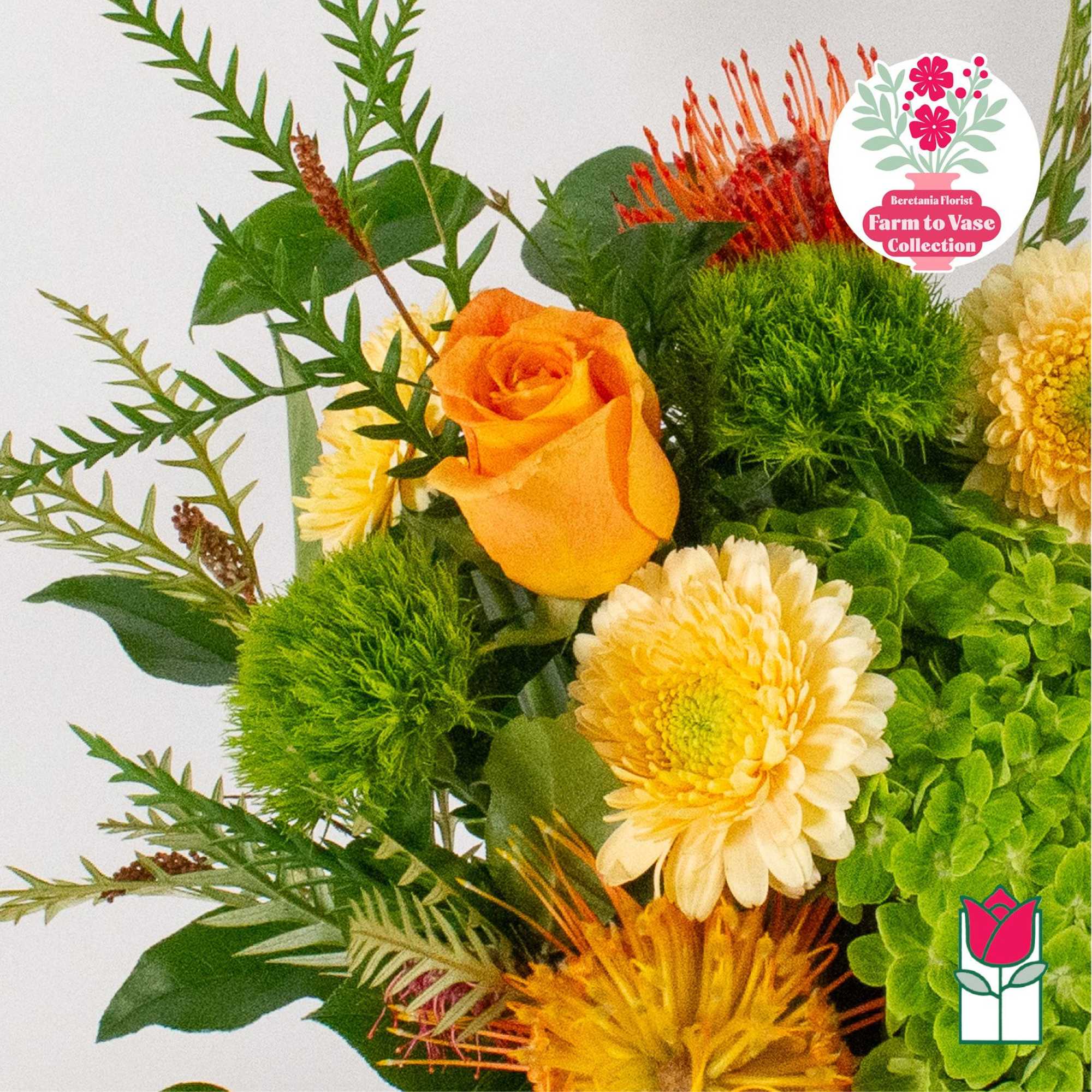 Orange rose with yellow daisies and green pom-pom flowers