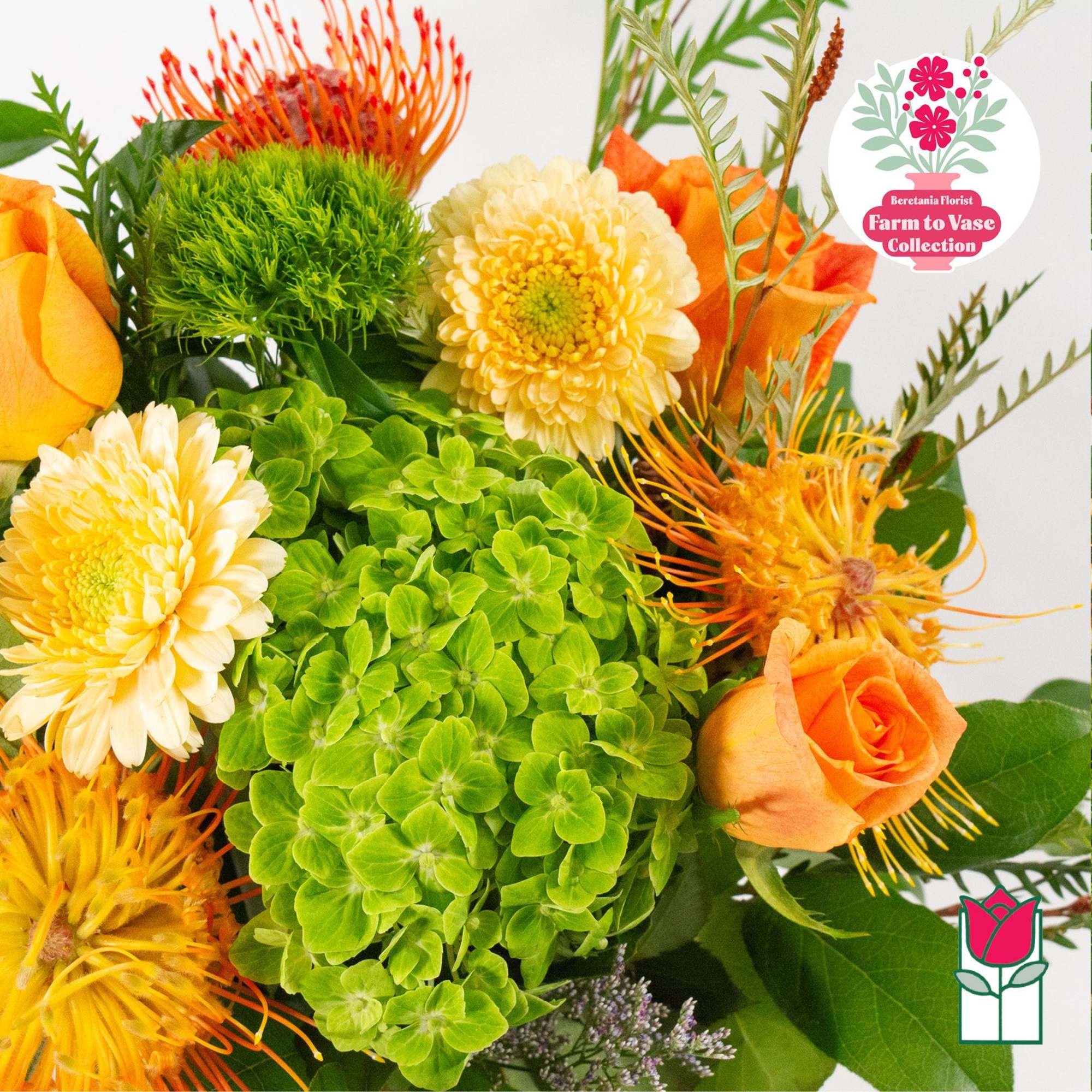 Orange and yellow bouquet with green hydrangea and chrysanthemums