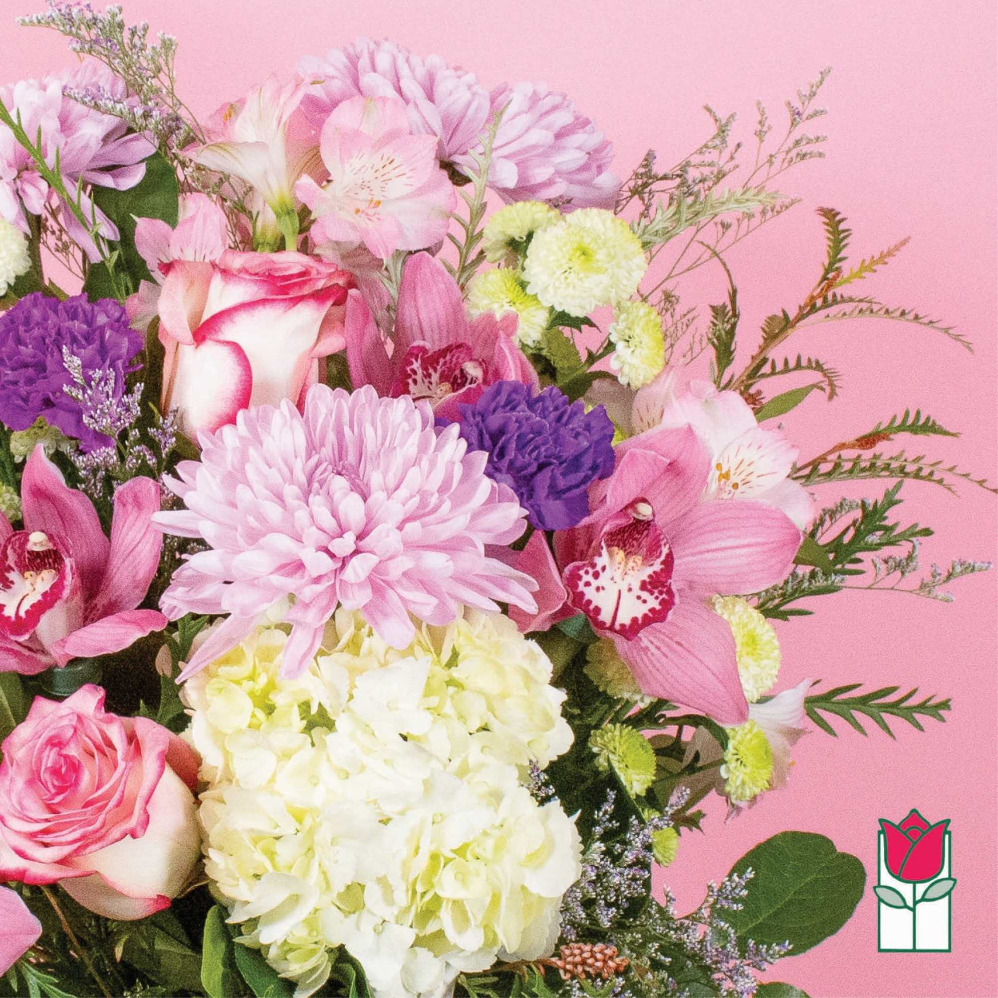 Pink and white mixed bouquet with roses, orchids, and chrysanthemums