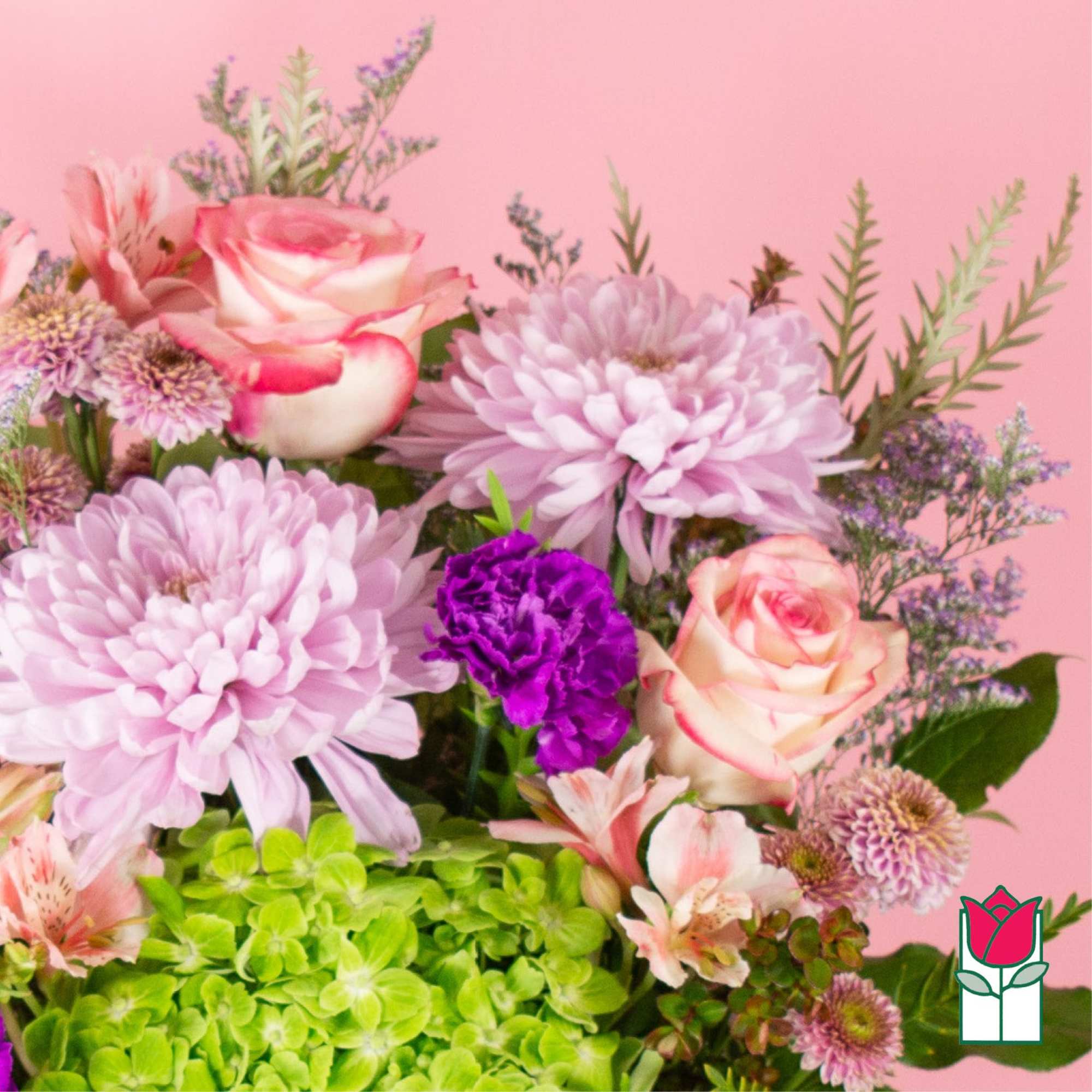 Pink and lavender bouquet with roses, chrysanthemums, and green hydrangea