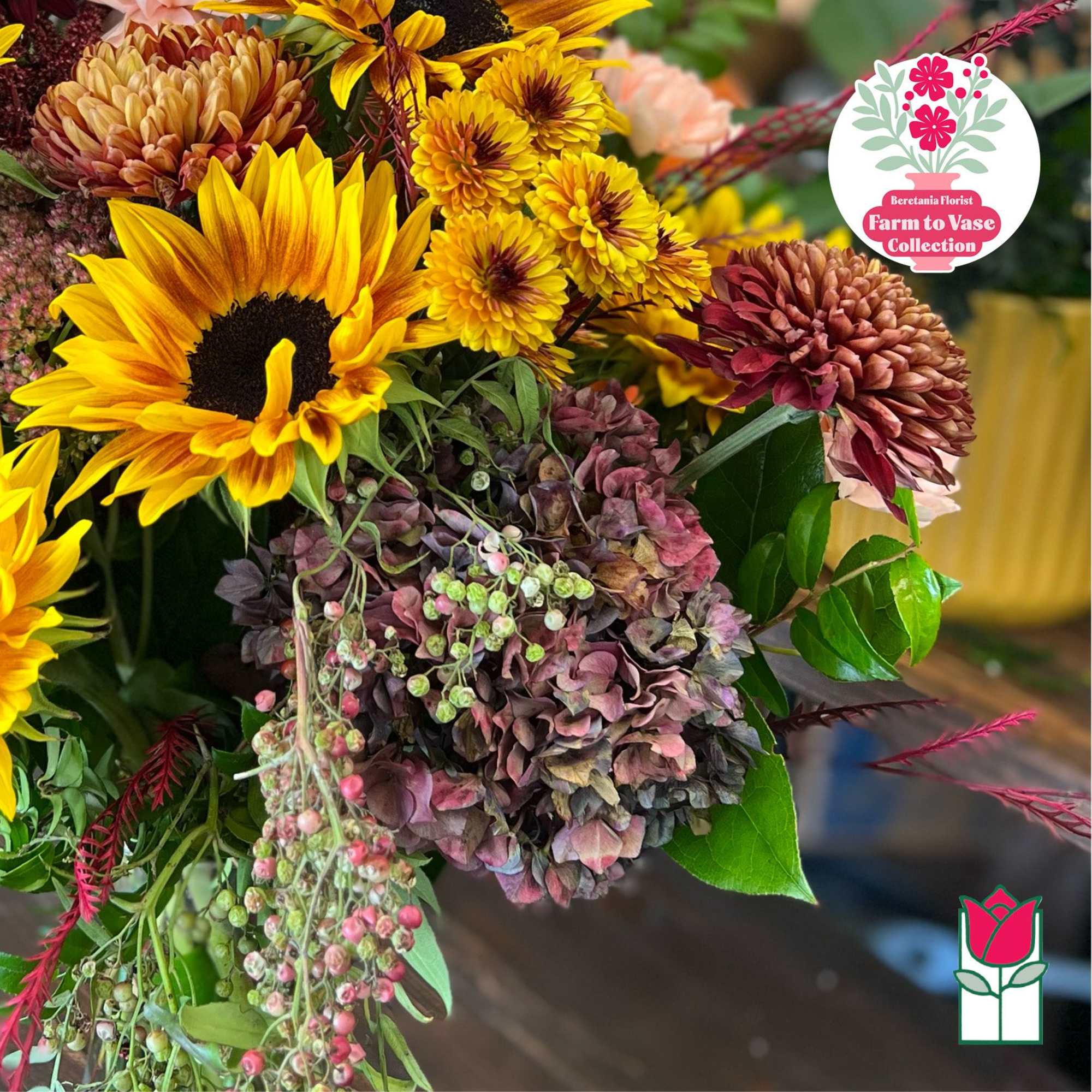 Bouquet with sunflowers, yellow mums, and burgundy hydrangea