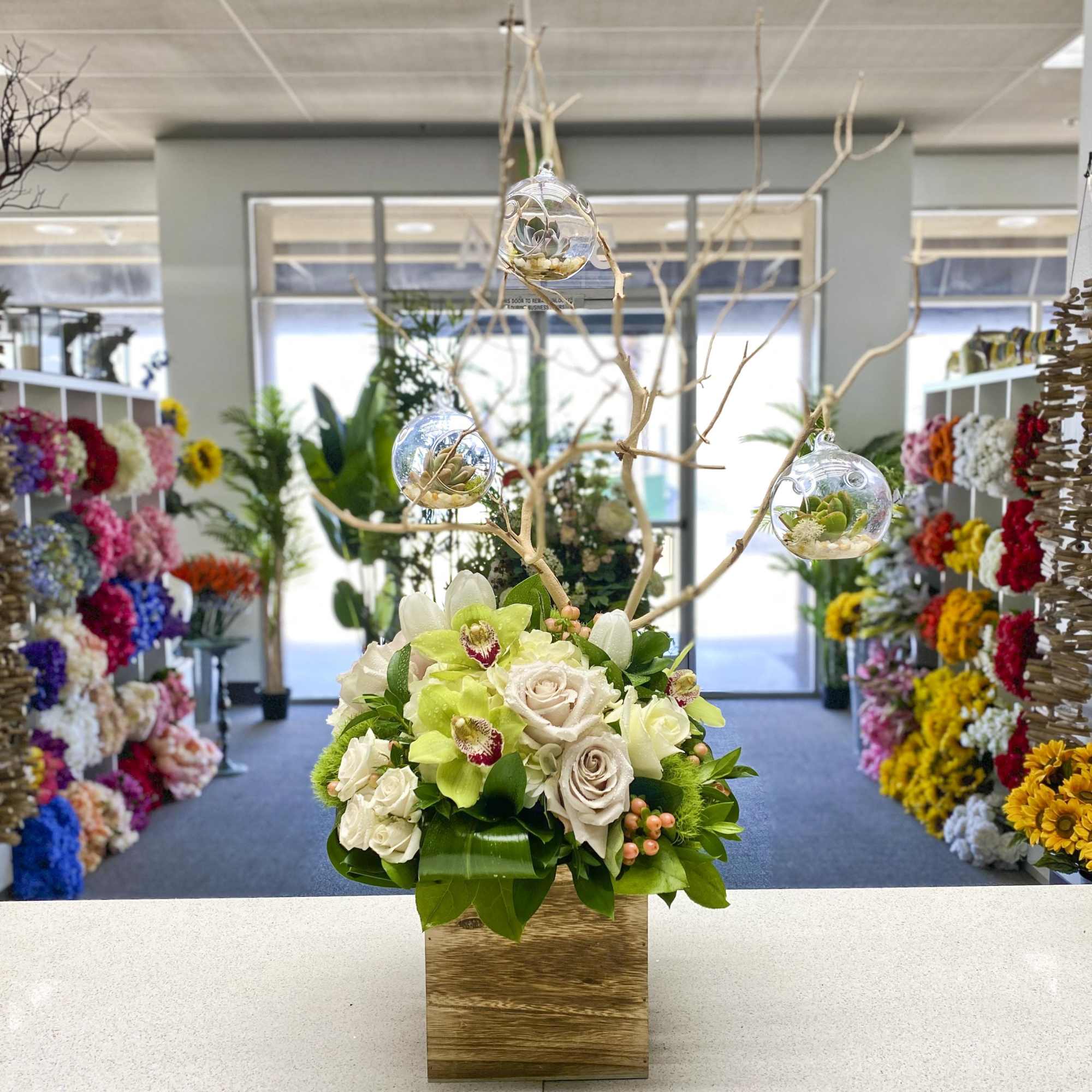 Beautiful arrangement comes with manzanita &amp; hanging succulents with lovely roses and