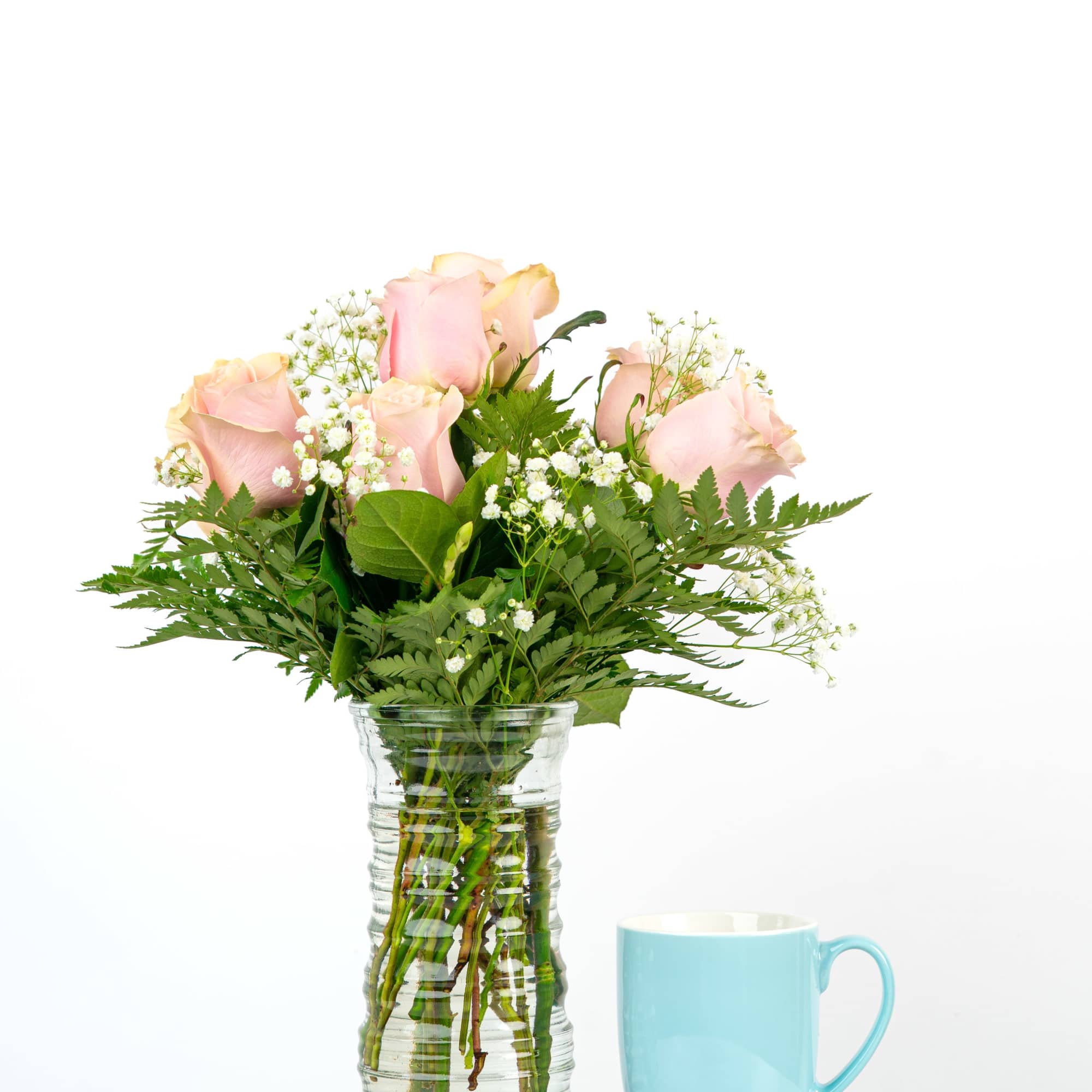 Looking for a classic and feminine arrangement of roses to celebrate someone