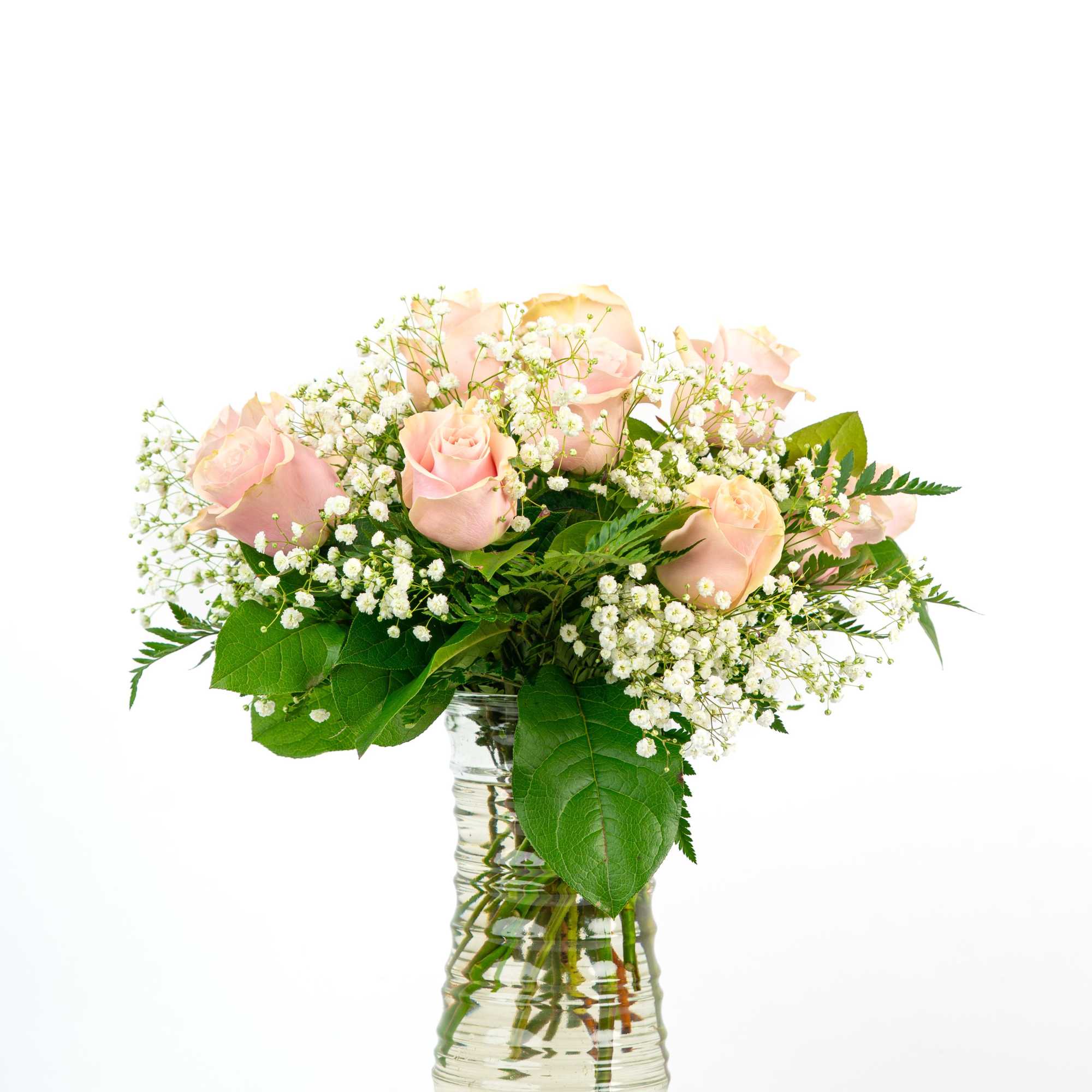 Looking for a classic and feminine arrangement of roses to celebrate someone