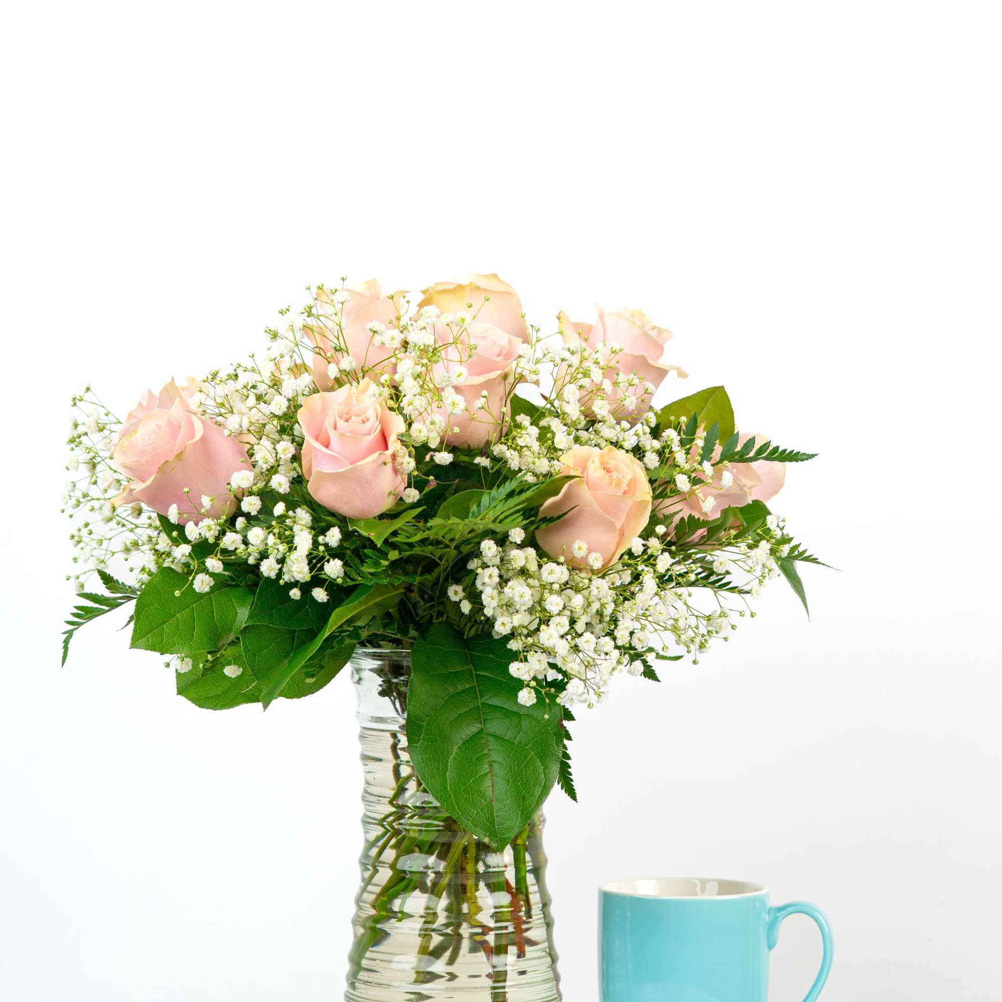 Looking for a classic and feminine arrangement of roses to celebrate someone