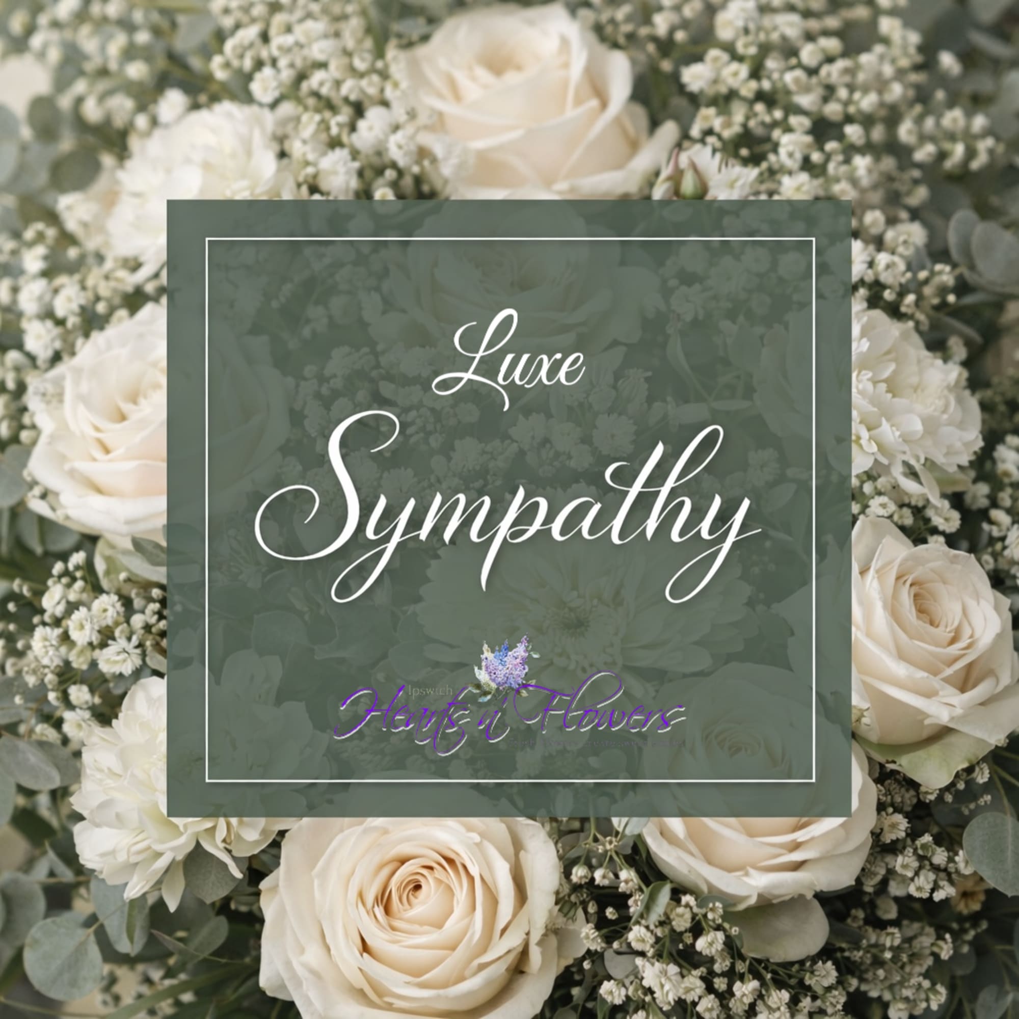 Cream roses and white filler flowers with a sympathy message card