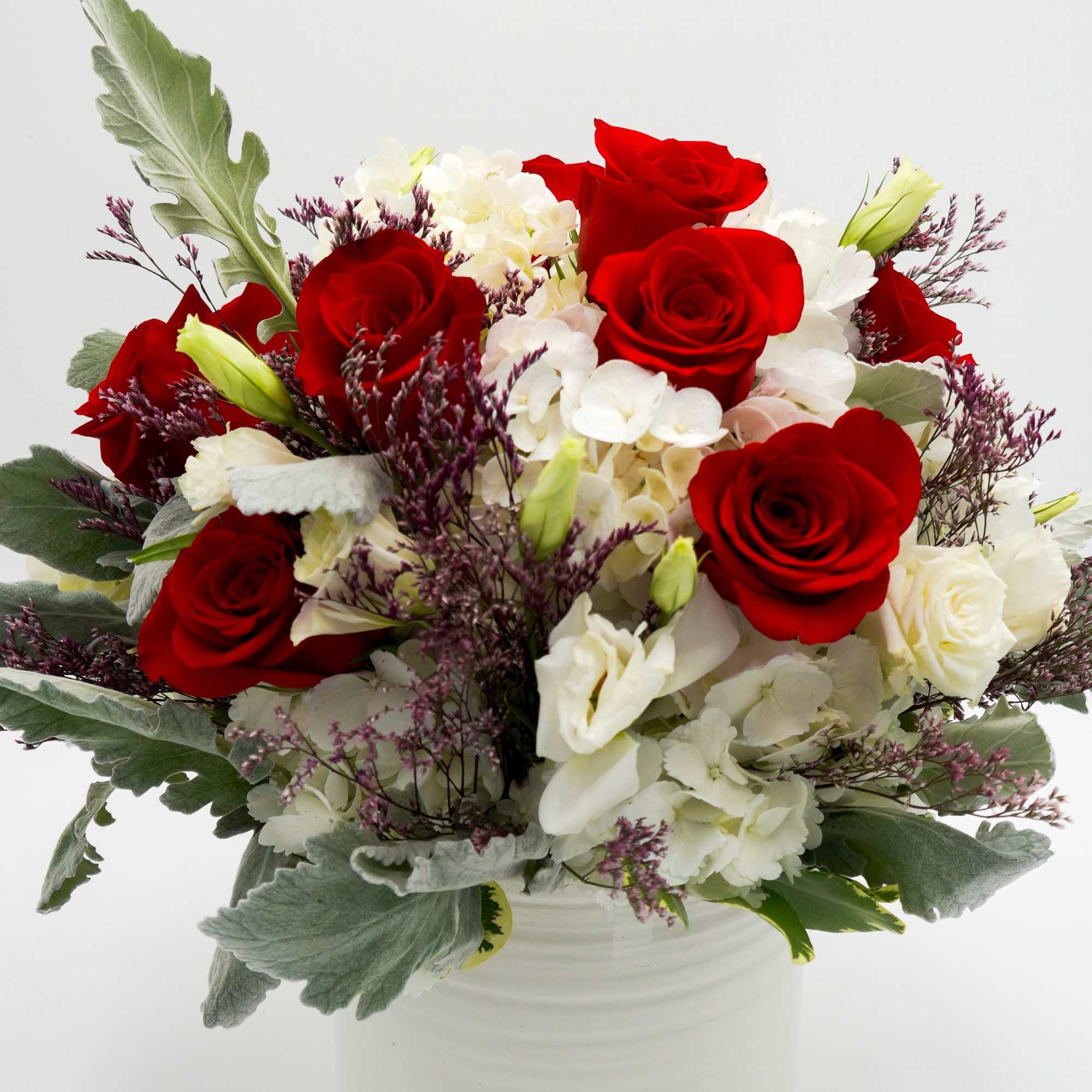 Send red roses, white hydrangeas, dusty miller and white lisianthus  Bouquet