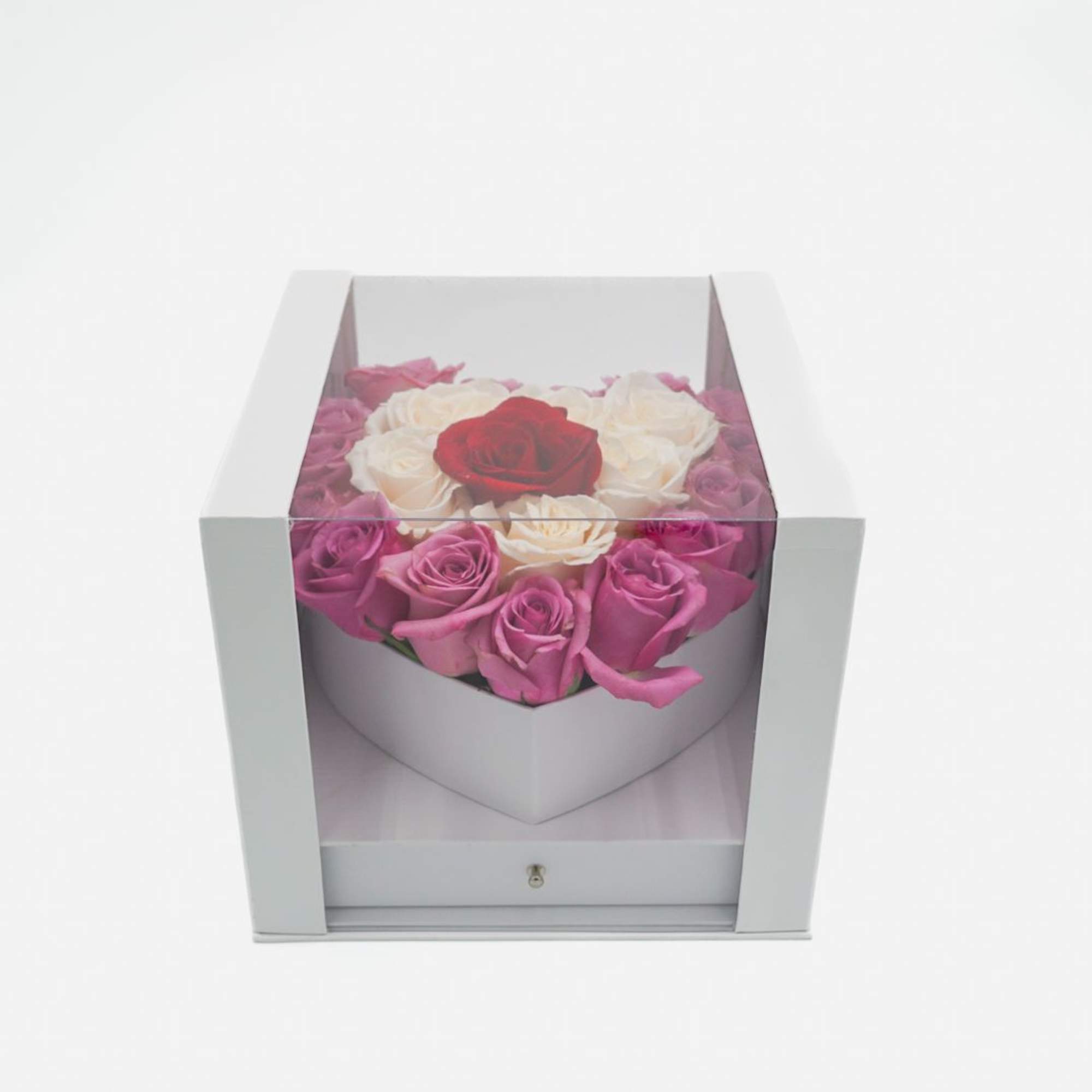 Boxed arrangement of pink, white, and red roses