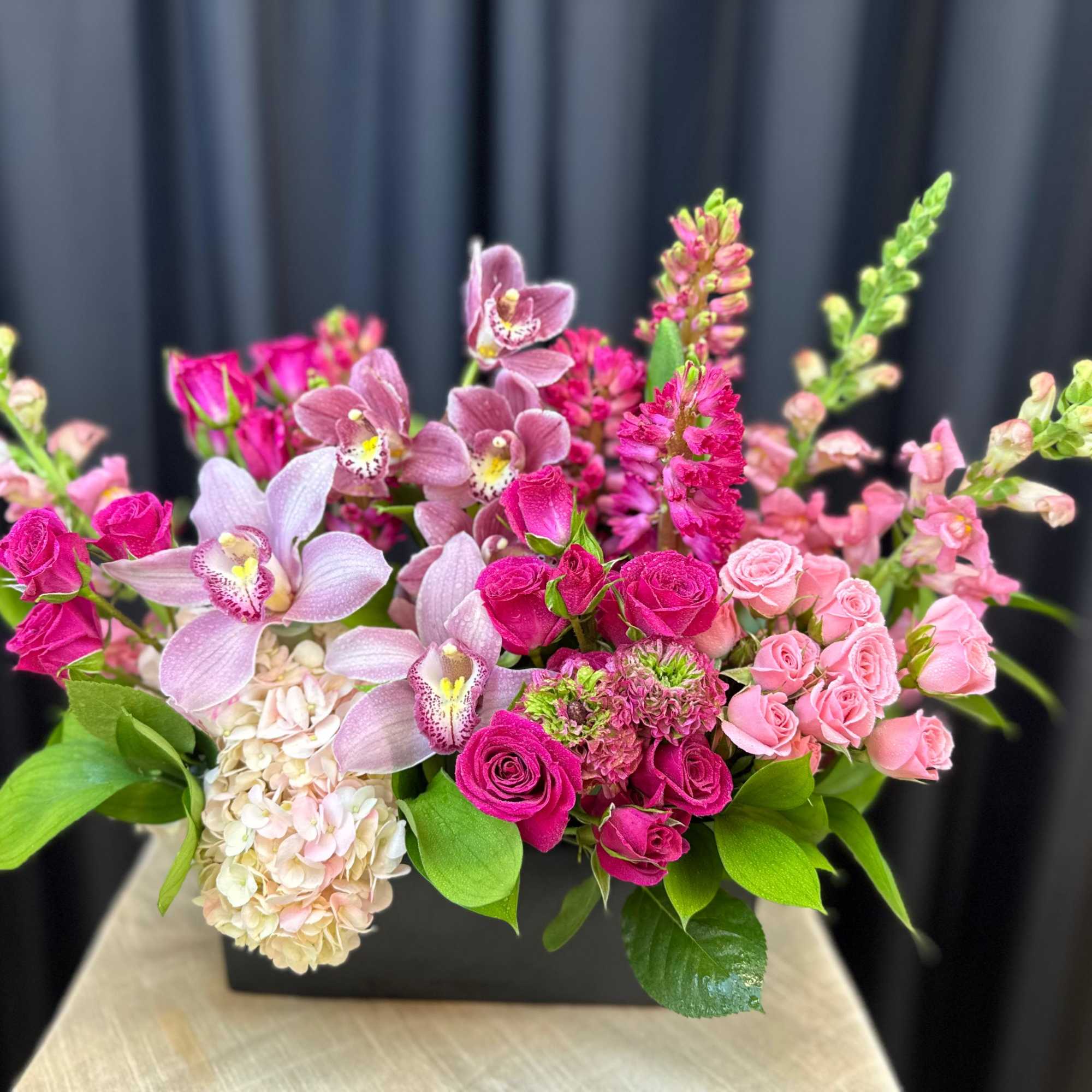 Pink Obsession is a striking, high-end arrangement that celebrates the beauty of