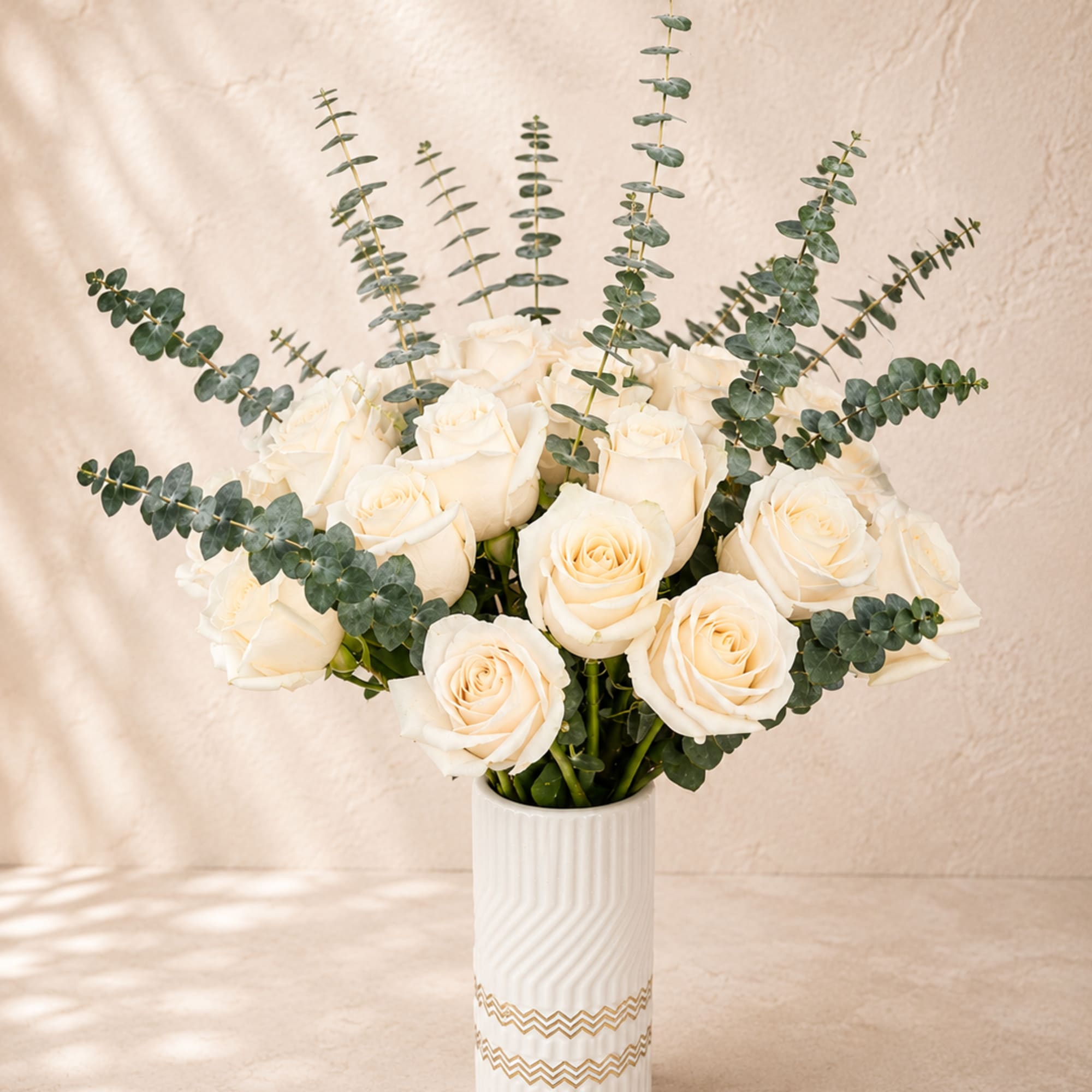 Graceful, refined, and effortlessly elegant, Aphrodite's Ivory Embrace showcases 24 premium white