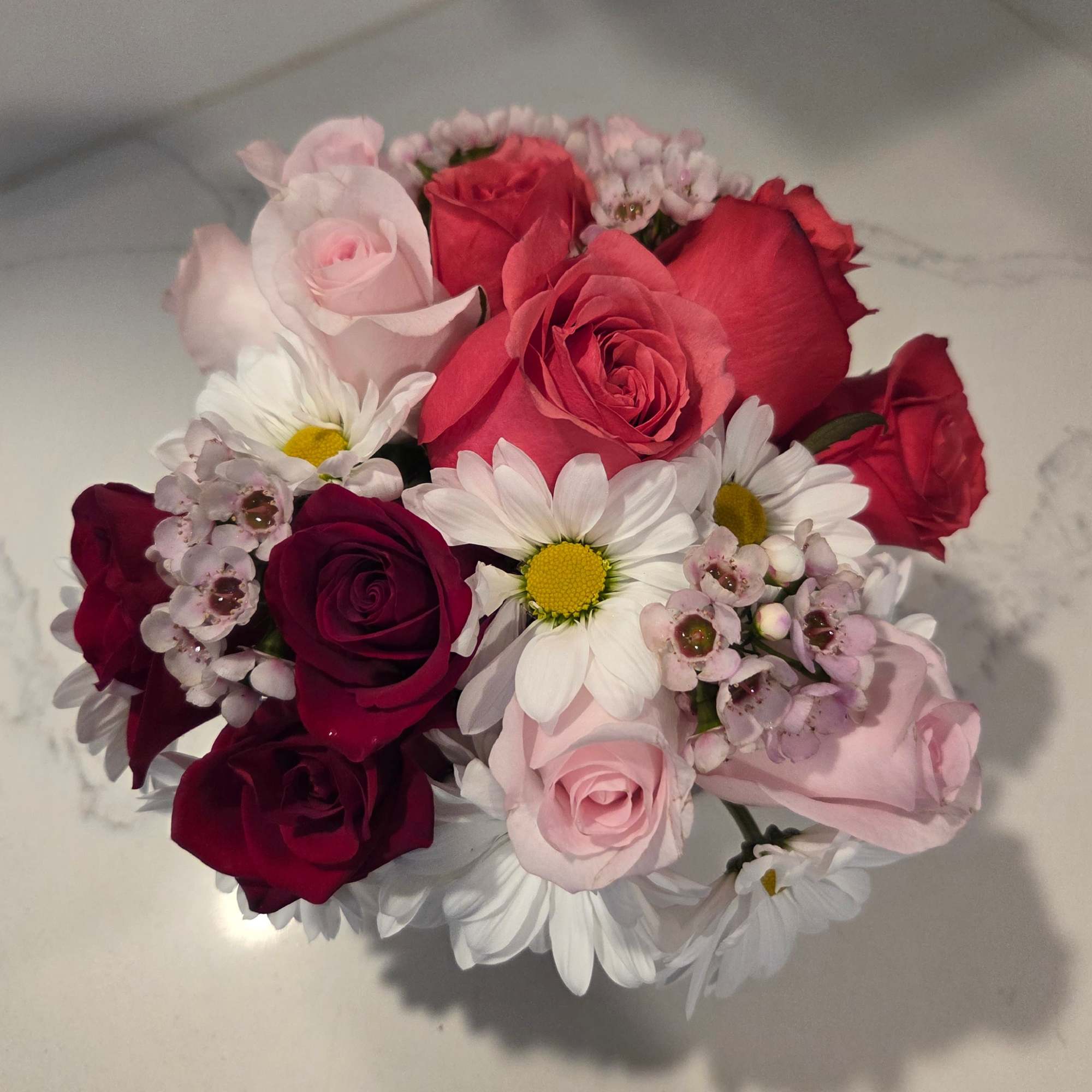 Filled with more than over 20 stems of pink, red and white, photo 2 of 3