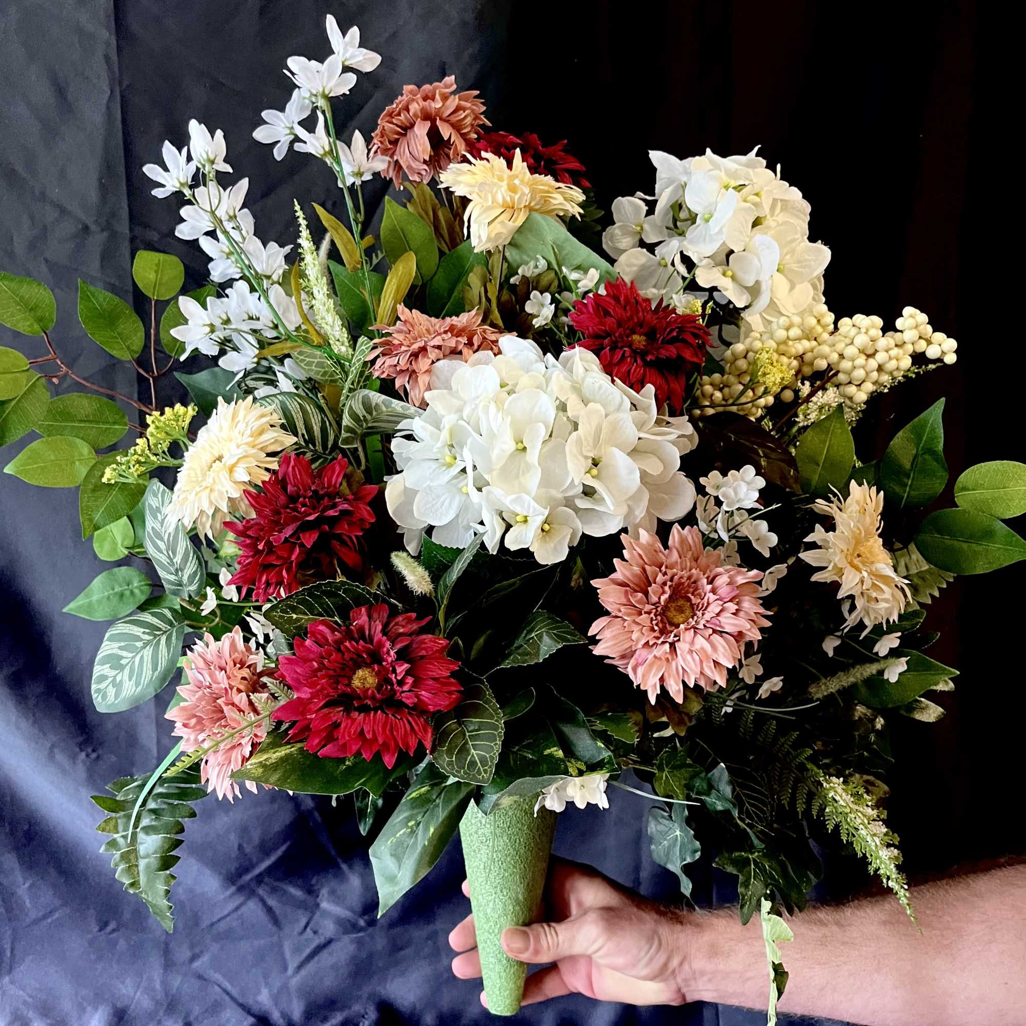 A lush cluster of white hydrangea-like blooms punctuated by deep red and, photo 2 of 2