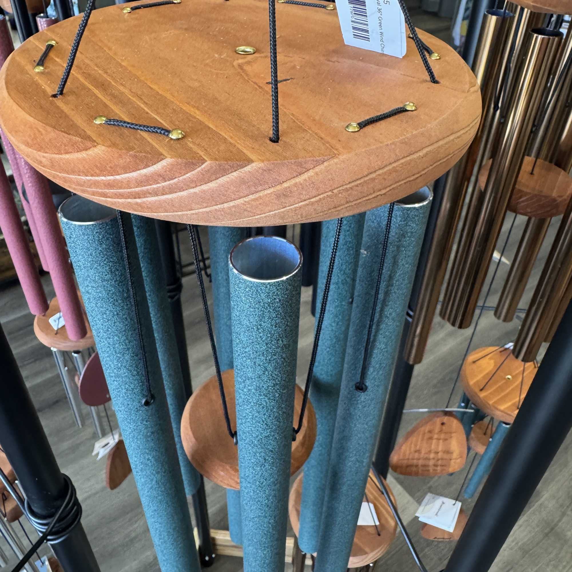 Hanging wind chimes with wooden tops and blue tubes