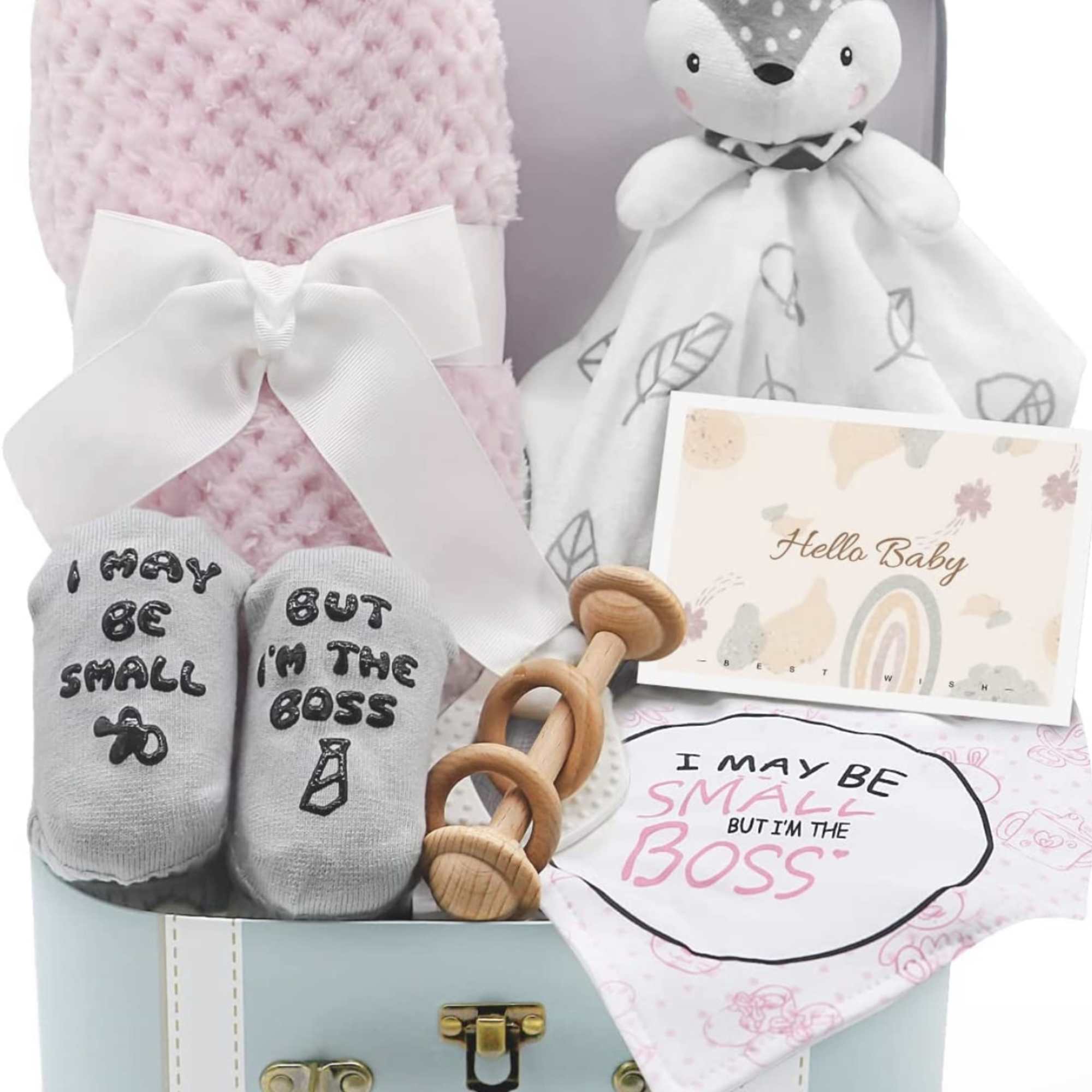 Baby gift basket with a pink blanket, plush fox, socks, and a card