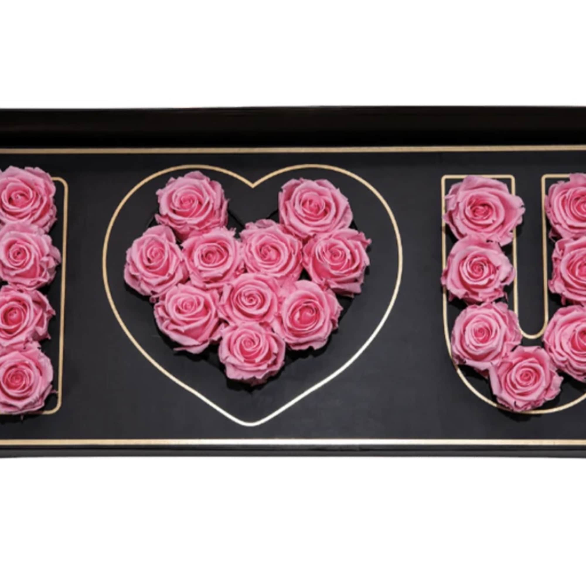 Pink roses arranged in an "I ♥ U" gift box