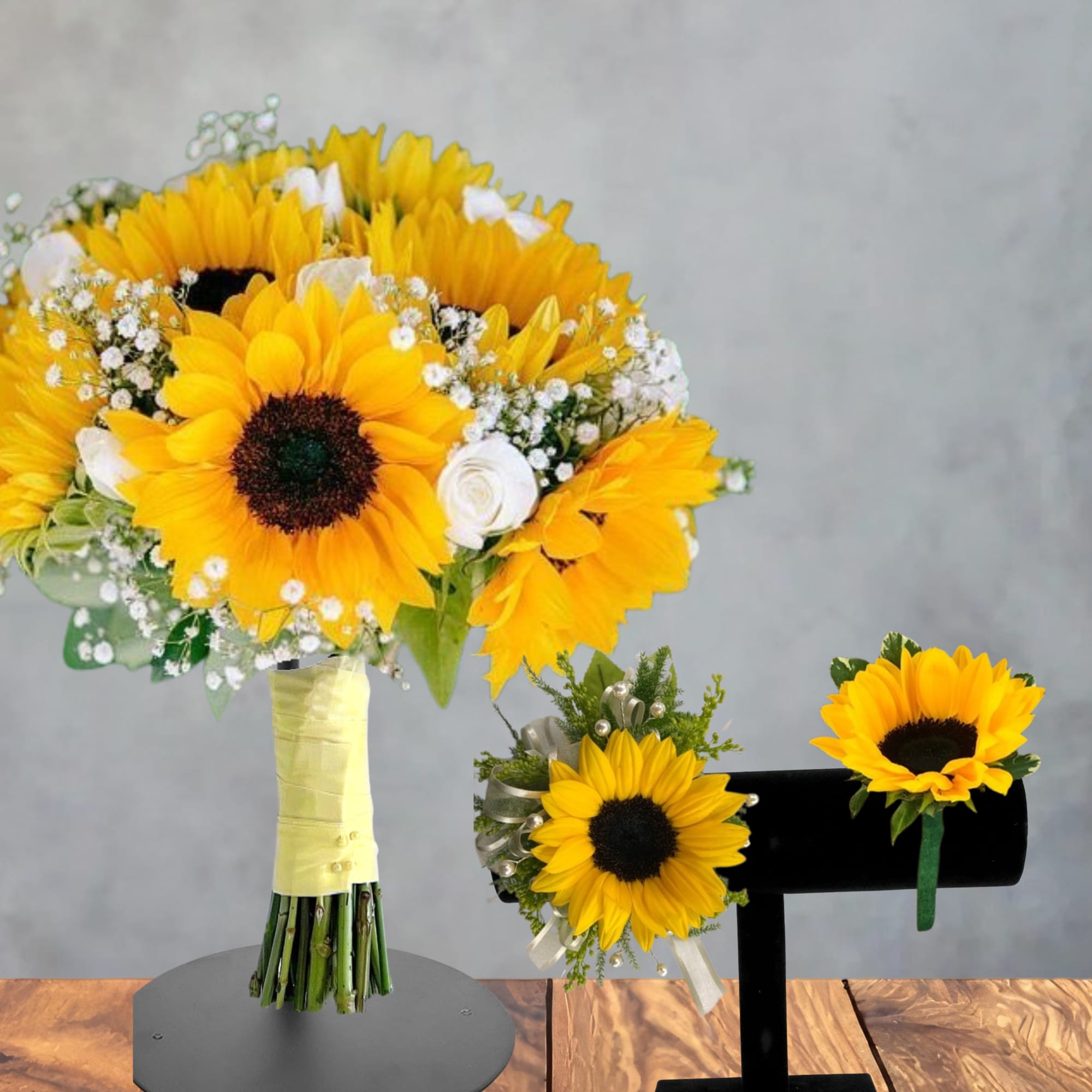 Sunflower bouquet with white filler flowers and a matching boutonniere