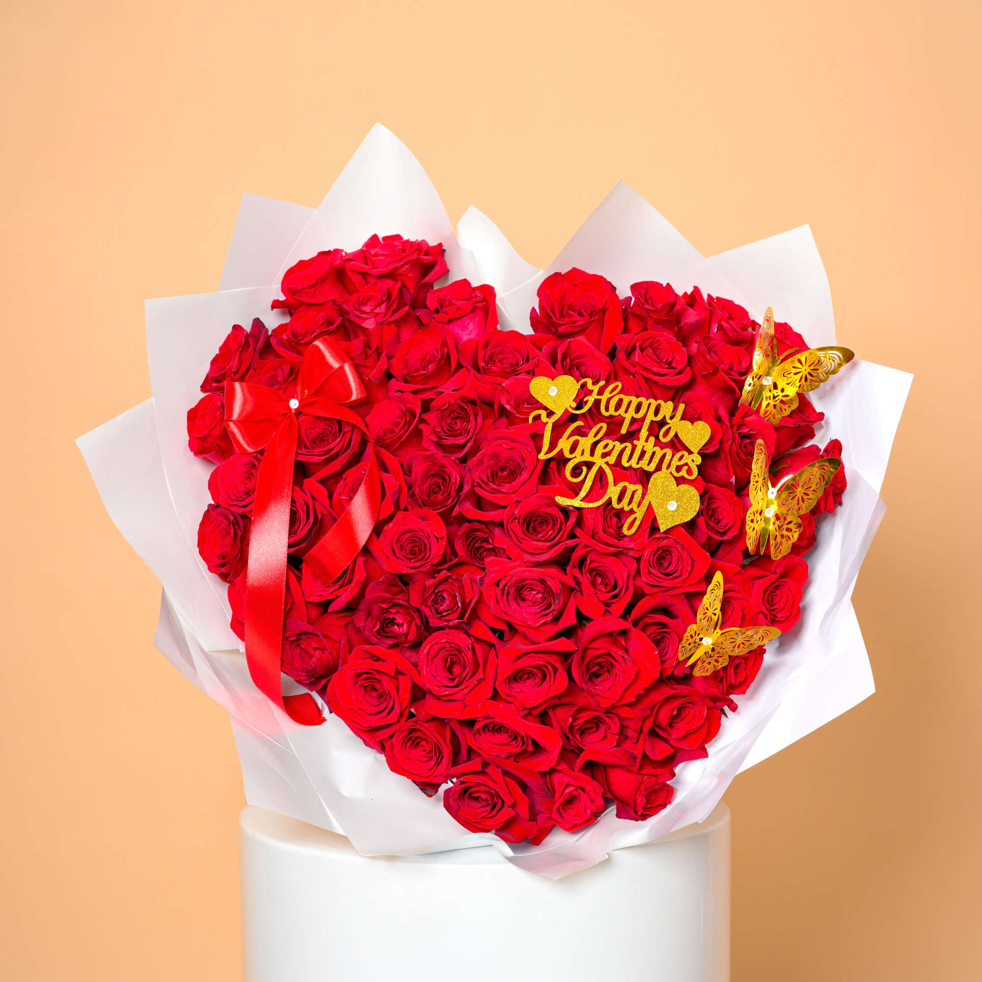 A breathtaking heart-shaped arrangement crafted from luxurious red roses, symbolizing deep love, photo 2 of 2