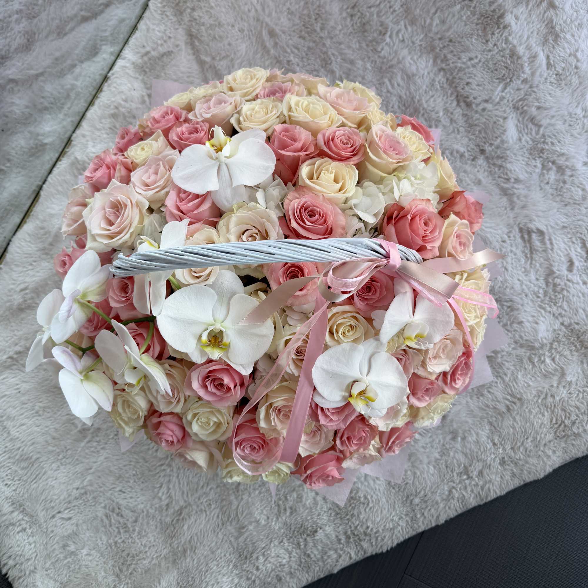 Premium quality pink and ivory roses, white hydrangeas and delicate orchids in